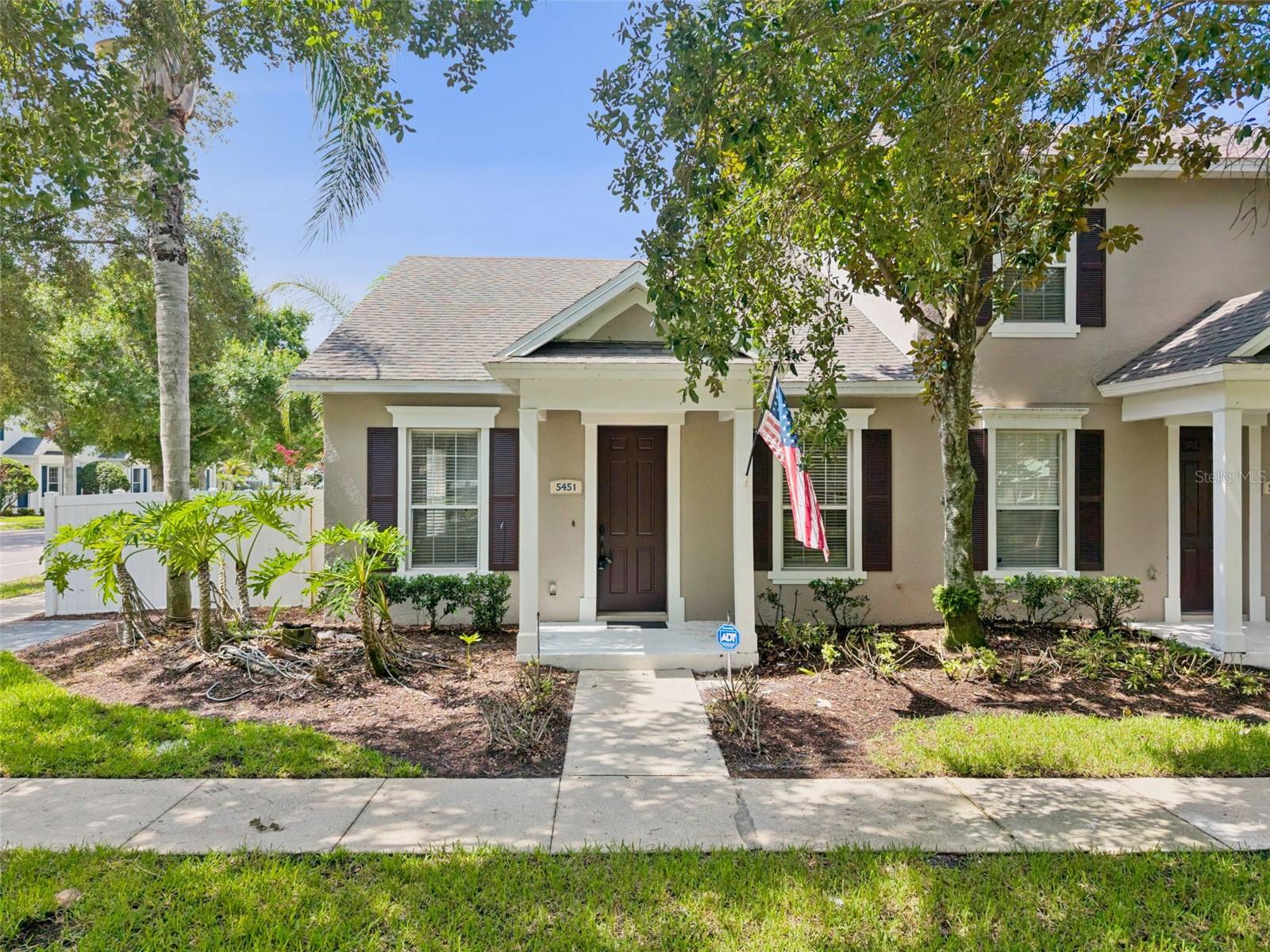 Very rarly does the end unit, one story townhomes come on the market! For anyone who doesn't want stairs, or master bedroom up - check this one out. Last 4 of these one story - sold in 4 days or less. HOA did new roofs and new exterior paint 2 years ago. New water heater (2026), newer A/C (2021). Front load washer/dryer will stay. 90% tiled floors, 1 room has engineered hardwood. Beautiful white PVC fence along side of house - perfect for the young ones or dog walk. Oversized side/end unit lot. Front overlooks community park. Another special point about this house has outdoor back patio enclosed to create another room - office, playroom, toy room.