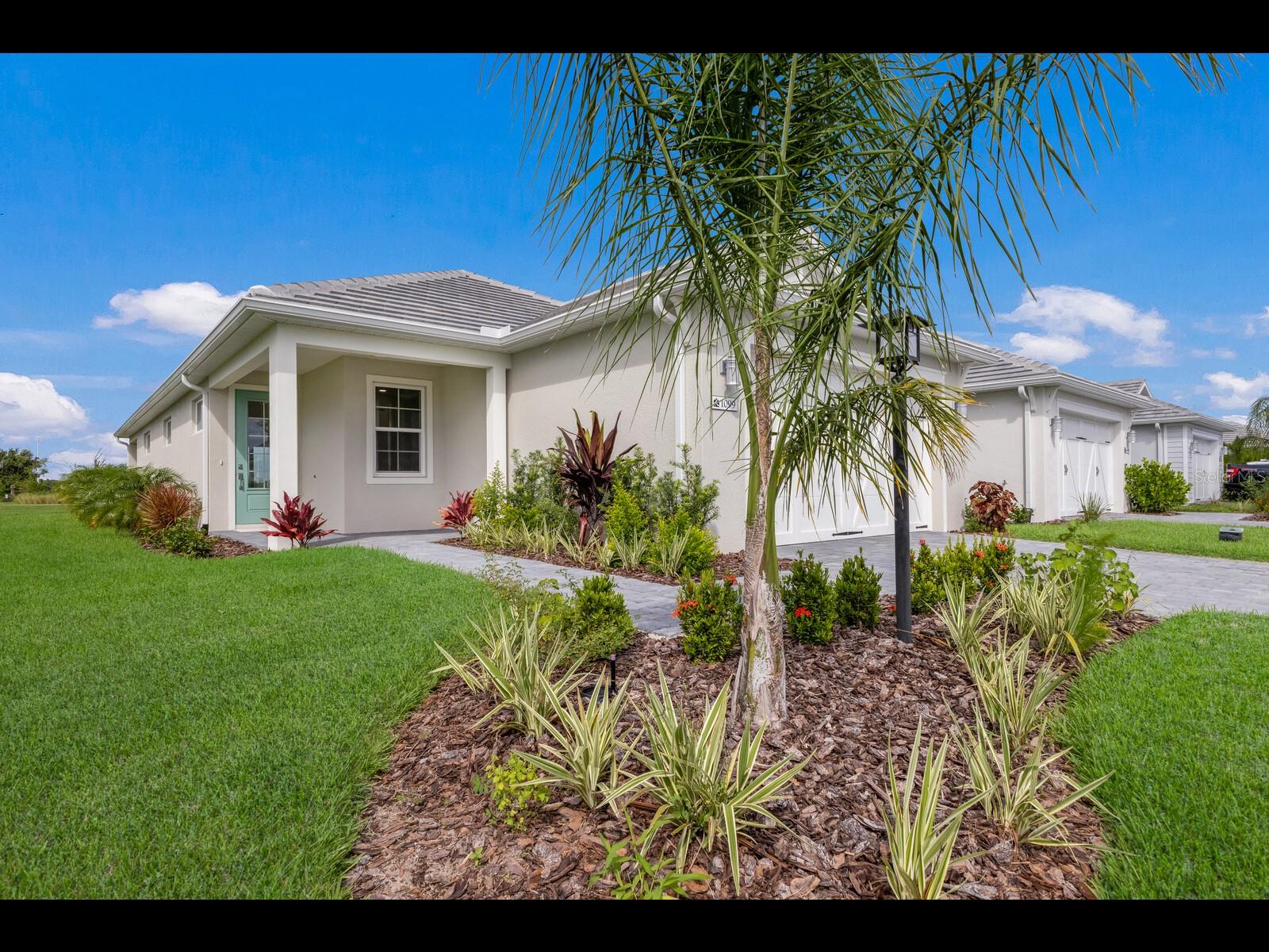 Welcome to LakeHouse Cove at Waterside, one of Lakewood Ranch’s most sought-after communities! This beautifully designed 3-bedroom, 2-bath residence offers approximately 1,798 square feet of thoughtfully crafted living space with stunning lake views and a desirable southwest rear exposure, providing breathtaking Florida sunsets from your covered lanai.

Built by Homes by Towne, this home features an open-concept floor plan filled with natural light, high ceilings, and elegant finishes throughout. The gourmet kitchen is the heart of the home, showcasing quartz countertops, stainless steel appliances, a spacious center island, ample cabinetry, and a walk-in pantry. The primary suite offers a private retreat with serene water views, a spacious walk-in closet, dual vanities, and a beautifully appointed walk-in shower. Hurricane-impact windows and doors provide added peace of mind and energy efficiency.

Step outside to enjoy peaceful lakefront living and picturesque sunset views from the covered lanai, creating the perfect setting for relaxation or entertaining guests.

Residents of LakeHouse Cove enjoy access to an exceptional collection of resort-style amenities, including a lakeside clubhouse, resort-style pool and spa, state-of-the-art fitness center, pickleball courts, bocce courts, kayak launch and storage, playground, dog parks, scenic walking trails, fire pit gathering areas, and a full calendar of community activities coordinated by an on-site lifestyle director.

Located within the award-winning Waterside district of Lakewood Ranch, residents are just minutes from Waterside Place, a vibrant waterfront destination featuring restaurants, boutique shopping, weekly farmers markets, live entertainment, community events, and outdoor recreation. Conveniently located near University Town Center (UTC), Lakewood Ranch Main Street, Downtown Sarasota, SRQ Airport, Nathan Benderson Park, and the world-famous Gulf Coast beaches.

Zoned for highly rated schools, including B.D. Gullett Elementary, Dr. Mona Jain Middle School, and Lakewood Ranch High School.

Experience the perfect combination of luxury, location, and lifestyle in one of Southwest Florida’s premier waterfront communities. Schedule your private showing today.