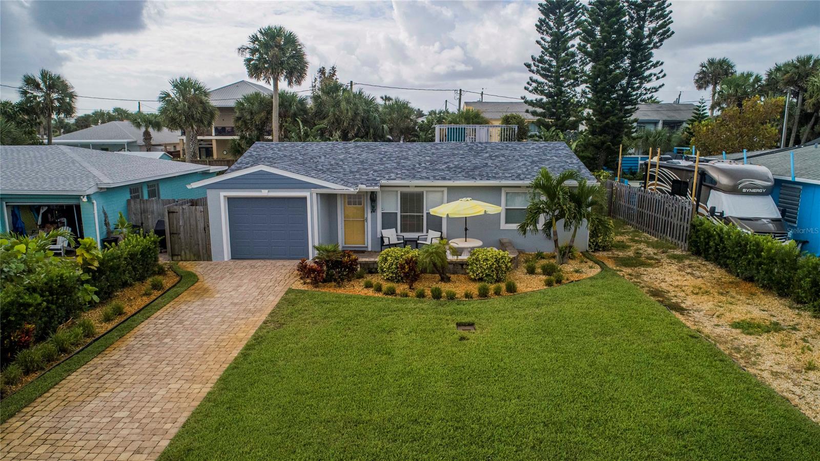 <UNDER CONTRACT, ACCEPTING BACKUPS> This luxury residence will take your breath away.  Perfectly located on North Beach, just 500' from the Ocean and walking distance to Flagler Ave for shopping, dining and entertainment. This home is meticulously maintained inside and out! Outside is adorned with a paver driveway and large patio in front to catch the ocean breezes. The fenced backyard is nothing short of a resort with custom pool, paver deck and covered lanai, tropical landscape, storage shed and a chef's outdoor kitchen with full outdoor pool bath.  There's even a stairway to a rooftop deck with partial ocean views! The inside doesn't disappoint either. This beautiful 3 bedroom home has been remodeled throughout with great attention to detail. Kitchen includes new white wood cabinetry, granite counters, stainless steel appliances (refrigerator in kitchen to be replaced with one in garage) with breakfast bar, new roof, electrical, plumbing, tile flooring and so much more. French doors off kitchen lead to the outdoor entertainment. All bedrooms are graciously sized and both inside bathroom are newly remodeled to the highest standards. The lot includes a 2nd driveway for RV/Boat parking with a 210A outdoor hook-up. This won't last so schedule your private showing today! All information is assumed accurate, but is not guaranteed nor meant to be solely relied upon. All measurements are approximate. Buyers and their agent should independently verify any information important to them. ;Water: City