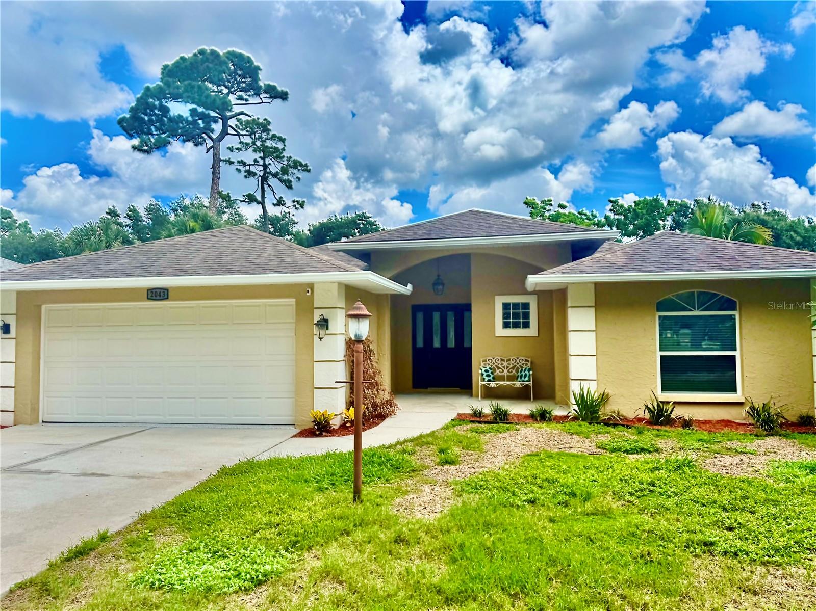 Charming 3-bedroom, 2-bathroom single-family home tucked away in a private setting. The fully fenced backyard offers plenty of space for pets, play, and outdoor entertaining. This desirable split-bedroom floor plan features soaring cathedral ceilings in the main living area, creating an open and airy atmosphere. Newer carpeting enhances the bedrooms, while tile flooring throughout the main living areas provides durability and easy maintenance.
Recent upgrades add both value and peace of mind, including new carpeting (2022), a Rain Bird irrigation system (2023), polyaspartic garage floor coating (2024), and a new A/C system (2024). Additional improvements include a new kitchen faucet and microwave (2026). The home is also equipped with hurricane shutters and a garage door keypad for added convenience and security.
Don't miss this opportunity to own a well-maintained home that combines comfort, privacy, and thoughtful updates in a desirable setting.