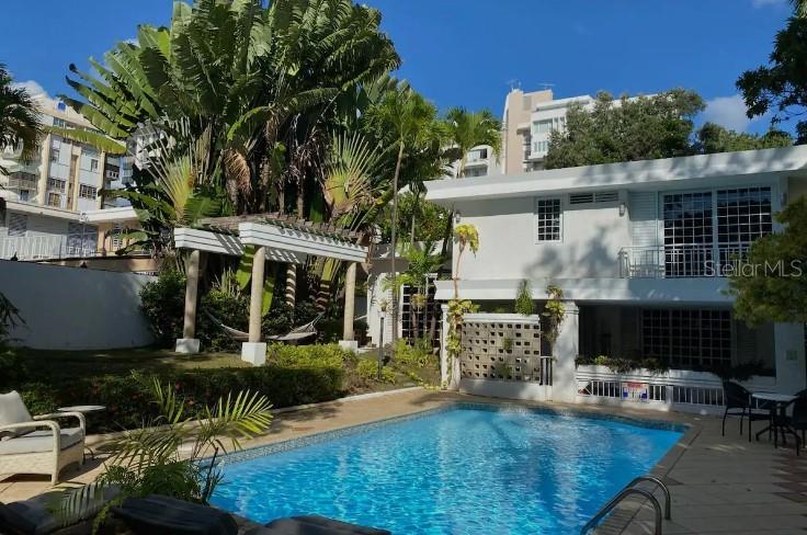 GOLDEN GATE | SAN PATRICIO | Executive Rental • Available Mid-July • Fully Furnished • Pool • Full Generator - 
Experience luxury living in the heart of Guaynabo. - Located in the established Golden Gate neighborhood near San Patricio, this beautifully maintained, fully furnished residence offers approximately 3,100 square feet of living space on a 901-square-meter landscaped lot. Designed for comfortable everyday living and effortless entertaining, the home combines generous indoor spaces with exceptional outdoor amenities. - 
The split-level, open-concept floor plan is filled with natural light and features spacious living and dining areas, a dedicated home office, and seamless access to an expansive covered terrace overlooking a private swimming pool and professionally landscaped grounds. - Available Mid-July - Thank you!