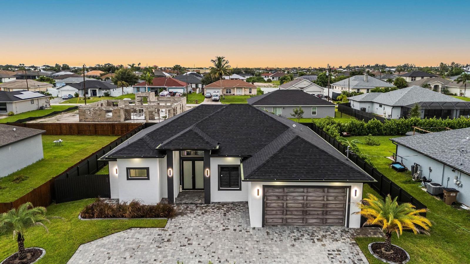 Brand-new modern home featuring 4 bedrooms, 3 bathrooms, and high-end contemporary finishes throughout. Sold fully furnished with all furniture included, making it truly move-in ready. Enjoy designer bathrooms, an open-concept layout, and a fully fenced backyard perfect for entertaining, family gatherings, and outdoor living. Located in a prime Cape Coral location with easy access to shopping, dining, schools, and major roads. Motivated seller, negotiable price, and easy to show. Don’t miss this exceptional opportunity!
