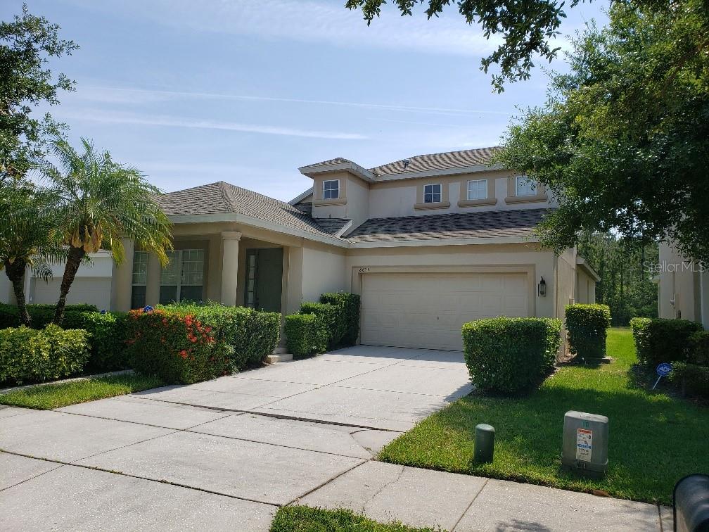 Mediterranean style property with five bedrooms, four and a half bathrooms on two floors in gated community.  New flooring. One of the bedrooms is on the first floor next to a full bathroom, making it ideal to function as an office or guest suite. The remaining bedrooms are on the second floor with the master bedroom has crown molding and a huge walk-in closet. Fully equipped kitchen with granite countertops, stainless steel appliances, and wait, yes, a gas range! To top it all off, it comes with a washer and dryer. The community has a swimming pool, tennis, basketball, sand volleyball, children's play area and weight room. You really must see this property to fully appreciate it. It is professionally managed, and rent includes lawn care, so this is worry-free living. Hurry and schedule a showing, this won't last, and you won't want to miss out. Please see the attached files.