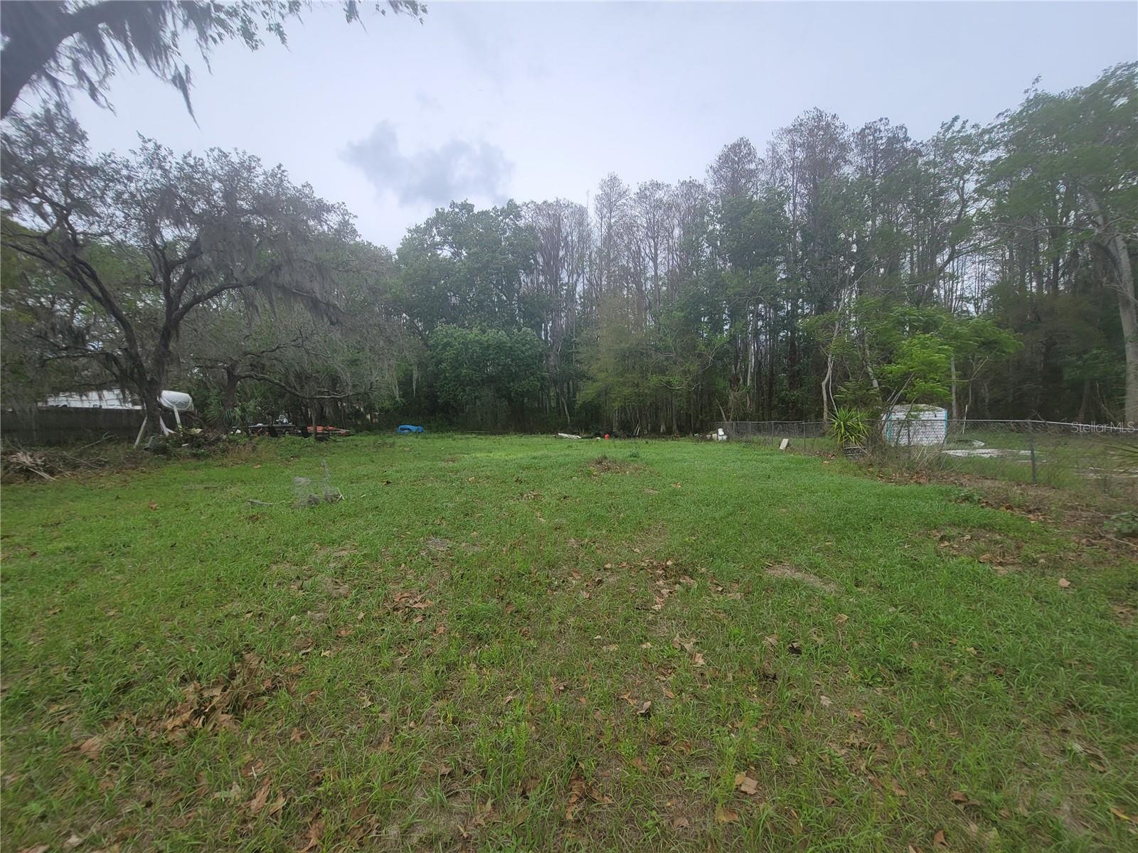 Rare Opportunity – .61 Acre Vacant Land in Bear Creek Estates, New Port Richey

Discover the perfect opportunity to build your dream property on this .61-acre lot located in the desirable Bear Creek Estates community in New Port Richey. This versatile parcel has already been cleared and is ready for development, offering an ideal setting for a custom site-built home, manufactured home, or long-term investment hold.

The property features paved, county-maintained road access, no HOA restrictions, and flexible Agricultural-Residential zoning, allowing both site-built and mobile/manufactured homes. An existing electrical post is already in place, providing convenient access for future utility connection.

Located just minutes from State Road 52, the property offers quick access to shopping, dining, and everyday conveniences, while still enjoying the peace and privacy of a quiet rural-residential setting. Outdoor enthusiasts will appreciate the nearby parks, nature preserves, and lakes, while the beautiful beaches of the Tampa Bay are only a short drive away.

With continued residential growth and expanding infrastructure throughout the area, this property presents an excellent opportunity for both homeowners and investors seeking land in a rapidly developing corridor of Pasco County.

Don’t miss your chance to secure a spacious homesite in a location that offers flexibility, convenience, and long-term potential.