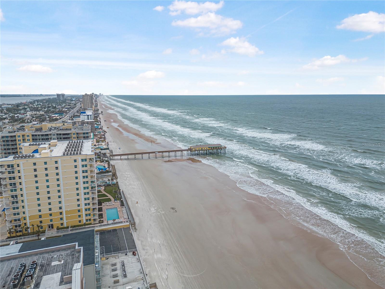 Stunning Fully Renovated Condo in Daytona Beach Shores! Experience the best of coastal living in this beautifully remodeled and tastefully decorated condo, ideally located just steps from the beach. This move-in-ready residence features a bright, open floor plan with modern finishes throughout and partial ocean views from the living room. Enjoy spectacular sunrises just across the street from the Atlantic Ocean.
The updated kitchen showcases sleek cabinetry, stainless steel appliances, and contemporary finishes, seamlessly flowing into the spacious living and dining areas—perfect for everyday living or entertaining. Every detail has been thoughtfully upgraded, creating a  comfortable beach retreat.
Whether you're searching for a primary residence, a vacation home, or an excellent investment opportunity with rental potential, this exceptional property checks every box. Conveniently located in the heart of Daytona Beach Shores, you'll be just minutes from restaurants, shopping, entertainment, golf, and all the attractions that make this coastal community so desirable.
Don't miss this opportunity to own your own piece of paradise. Schedule your private showing today!