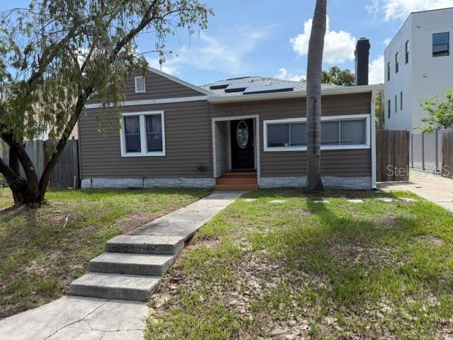 Located in the sought-after Greater Woodlawn neighborhood, this move-in-ready 3-bedroom, 2-bath pool home is just minutes from Downtown St. Petersburg. Offering 1,569 sq. ft. of single-level living, the home features fresh interior paint, new flooring and subflooring, and a functional layout ideal for a variety of lifestyles.

Enjoy a private backyard with a sparkling pool and space for entertaining. The detached garage with electric and an additional refrigerator offers flexibility for storage, a workshop, gym, or studio. A spacious driveway provides parking for up to three vehicles in addition to the garage.

Major updates include plumbing improvements, crawlspace encapsulation, mold and HVAC remediation, a new flat roof, new gutters, and a renovated garage. Conveniently located near downtown dining, shopping, parks, and entertainment, this home combines neighborhood charm with modern updates and peace of mind