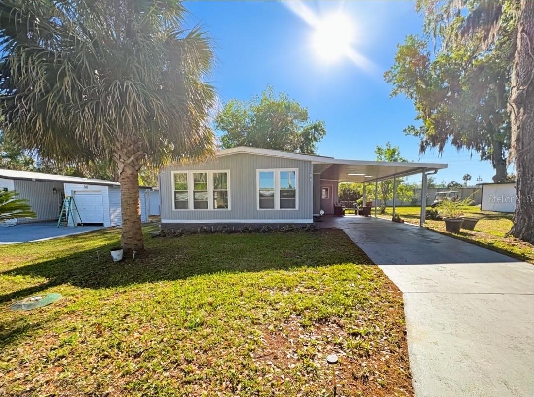 PRICE IMPROVEMENT!!! Welcome to this charming home offering nearly 1,300 square feet of comfortable living space, thoughtfully designed with an open floor plan perfect for both everyday living and entertaining. The spacious layout features a bright and airy living room and dining room combination, seamlessly flowing into a large, open kitchen with plenty of room for cooking, gathering, and storage.
In addition to the main living areas, you’ll find a separate family room—ideal for relaxing, a home office, or a media space. The home sits on an oversized lot, providing exceptional privacy and plenty of outdoor space to enjoy. The entire outside of the home was recently painted.
Recent updates add peace of mind and modern appeal, including a brand-new air conditioning system installed in February 2026 and a new water heater in March 2026. All the flooring was installed in 2024. The home also features new front windows, a new sliding glass door, newer appliances throughout.
An oversized carport offers ample covered parking and additional storage space. With its combination of updates, space, and privacy, this home is a fantastic opportunity you won’t want to miss.The community is absolutely gorgeous with countless amenities, which include: large swimming pool with hot tub, 18 hole championship golf course, driving range and putting greens, shuffleboard, tennis, pickle ball, fitness center, library, billiards room, softball field, and a 5 star restaurant and lounge. What more can you ask for? This is a beautiful home in a beautiful community. You won't be disappointed!!!