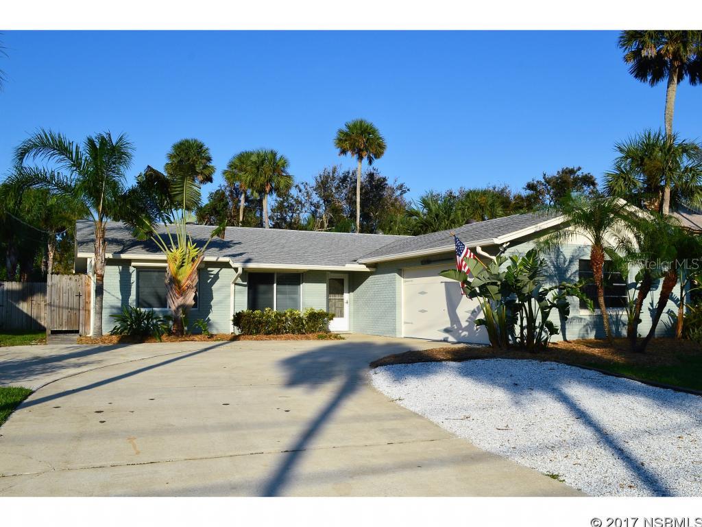 Wonderful SOLID built 3/2 Beachside home in superior area within walking distance to the no drive beach. Surrounded by lush landscaping this home is nicely upgraded and features an open floor plan w/ split plan bdrs, crown molding, custom lighting, stainless steel appliances, island kitchen and more. Extremely nice windows. Unique lot with mature tropical vegetation and plenty of shade. Tremendous amount of space for entertaining friends and family. This is a great value for the island community of Silver Sands. Outdoor paver patio area, with both covered and open-air sections. Large privacy fenced yard with plenty of room for your new pool.  Shops and restaurants only minutes away. Small boat launch nearby. You new beachside private paradise awaits. This home sold AS IS, inspections welcomed. ;Water: City