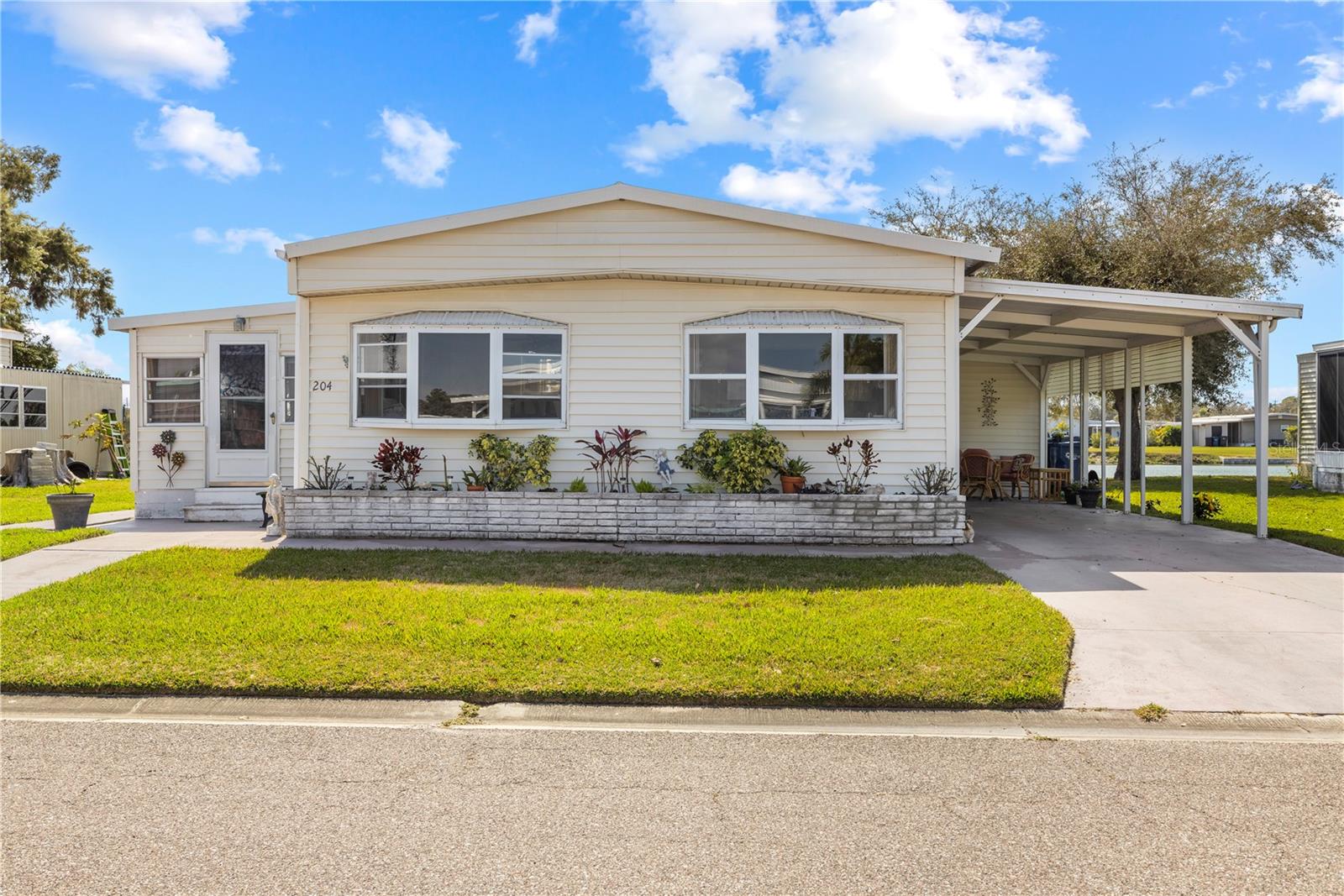 Welcome to this charming 2-bedroom, 2-bath home nestled in a peaceful, all-ages neighborhood in Bradenton, where tranquil water views create a relaxing everyday backdrop.

Inside, the layout feels comfortable and inviting, with sliding doors that open to a rear deck overlooking the lake. It’s an ideal spot to enjoy quiet mornings, unwind in the evenings, or simply take in the calm surroundings.

The setting offers a sense of quiet while still being close to everything that makes Bradenton special. Explore the natural beauty of Robinson Preserve or enjoy the shops and dining of downtown. The Gulf beaches are also just a short drive away, making it easy to enjoy the sun and shoreline whenever the mood strikes.

With its peaceful water view and welcoming feel, this home offers a wonderful balance of comfort and everyday convenience.