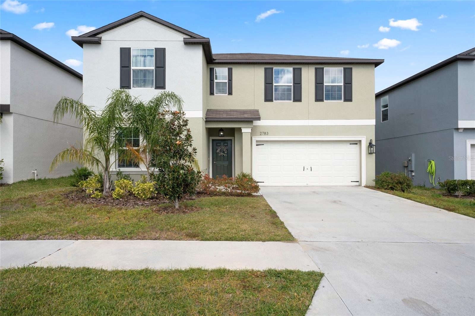 Welcome to your dream home in charming Bartow, Florida! This impressive six-bedroom residence boasts one of the largest floor plans in the area, perfectly designed for comfort and functionality.

Main Level Highlights:
The spacious split-floor plan features a master suite and a second bedroom with an additional full bathroom conveniently located on the first floor. Just beyond the formal dining or sitting area, you’ll discover a beautifully designed kitchen that opens into a combined family and dining room—perfect for modern living and entertaining. The kitchen is a chef’s delight, featuring elegant stone countertops, abundant cabinet space, and a generous walk-in pantry.

Sliding glass doors off the family room lead to a partially fenced backyard with a tranquil conservation area, ensuring privacy and no rear neighbors—ideal for peaceful mornings or evening gatherings.

Second Level Features:
Upstairs, a versatile second living room provides the perfect setting for a game night, movie night, or a casual retreat. The remaining four bedrooms, including one with a walk-in closet, share a well-appointed bathroom, offering ample space for family and guests alike.

Whether you’re a large family, multi-generational household, or simply seeking room to spread out, this home is tailored to meet your needs. With its thoughtful layout and desirable location, this property offers both style and functionality.

Don’t miss the chance to make this stunning home your own! Schedule a tour today and experience all it has to offer.