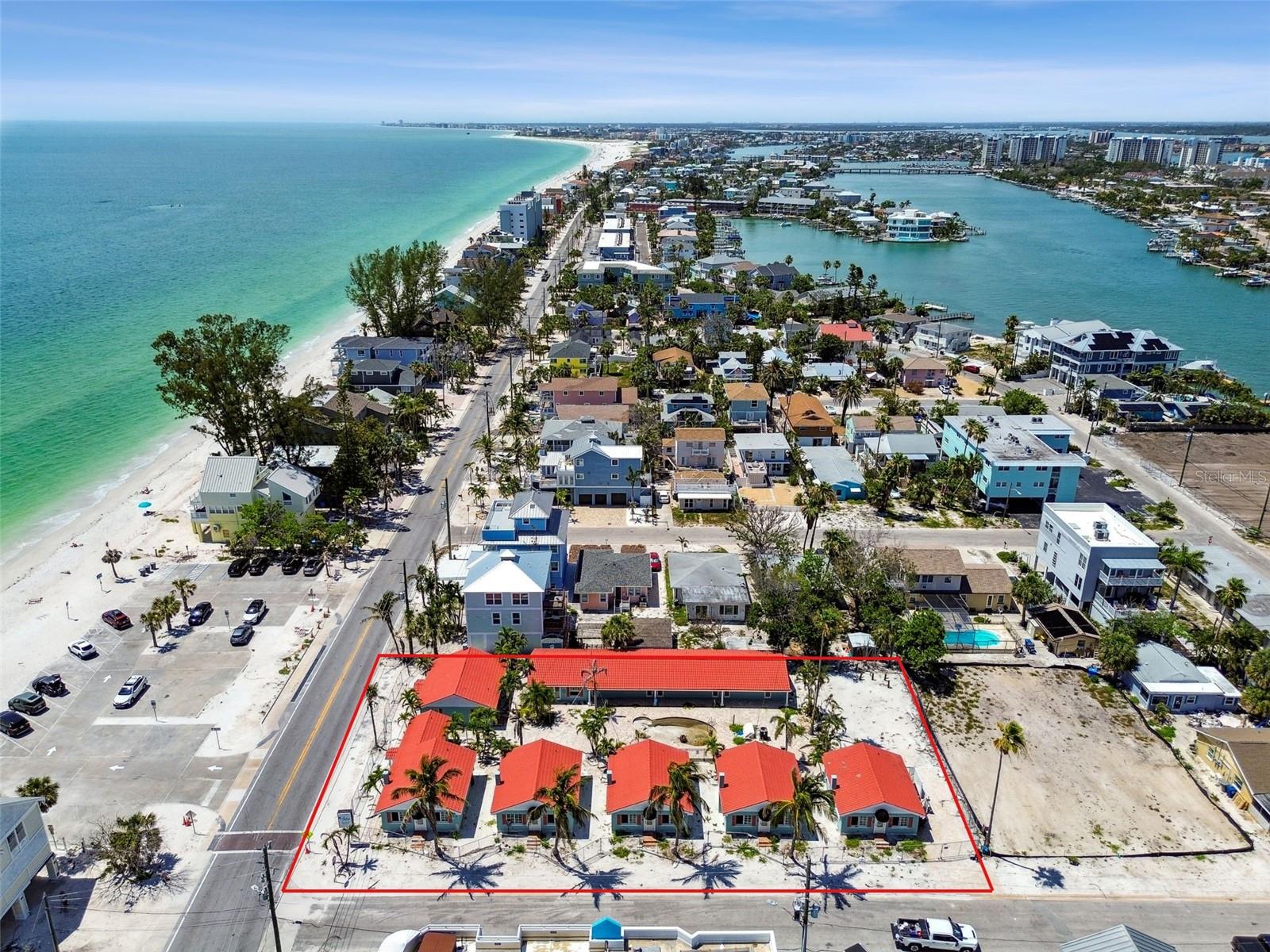 SELLER FINANCING AVAILABLE! Welcome to the Blue Waters, your perfect beachfront escape vacation rental hotel. Nestled along the stunning Gulf of Mexico, this hotel offers guests an idyllic retreat filled with sun, sand, and endless activities. Situated in the heart of Treasure Island, Blue Waters places you just steps away from pristine white sandy beaches and crystal-clear waters. With 13 units spread out across 13 parcels and already set up as condos, the opportunities abound. The units range from studios, one bedrooms and two bedroom to appeal to all travelers. Renovate and continue operating as a daily rental hotel or explore the future use with the approved six unit townhomes with Gulf views. The units are spread across six cottages and a larger inn building. Ample off street parking makes running this hotel on Sunset Beach a breeze, a rarity for this area. All units feature a kitchenette. The outdoor courtyard area with pool is a highlight of the Blue Waters, where guests can unwind in a serene setting, go for a refreshing dip, lounge under the Florida sun or enjoy barbecues and outdoor dining options, making it easy to savor delicious meals in the warm coastal air. A laundry room is also on site. 

This property appeals to guests who are looking to relax under the sun and explore the vibrant local scene. The prime location provides easy access to water sports, dining, and shopping. Activities such as paddle boarding, parasailing, and jet skiing are close by on both St Pete Beach and Treasure Island. The beach is just steps across the street with beach views available from the property most days.   

The hotel sustained water intrusion from Hurricane Helene. SELLER FINANCING IS AVAILABLE ON PURCHASE AND REPAIR COSTS! Additional information upon request. 

Located in the St Petersburg / Tampa metro area. Serviced by Tampa International Airport, St Pete Clearwater International Airport and Sarasota Bradenton International Airport.