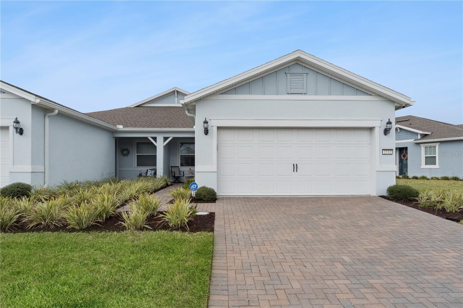 This exceptional 2-bedroom, 2-bathroom villa with a versatile den is located in the highly sought-after Del Webb Sunbridge 55+ community. Thoughtfully upgraded throughout, this beautiful home features luxury vinyl plank flooring, smart lighting, plantation shutters, and a custom-designed closet in the primary suite.The gourmet kitchen is a chef's dream, showcasing upgraded soft-close cabinetry, premium stainless steel appliances, and a gas range. The luxurious primary bathroom offers a spa-like retreat with a floor-to-ceiling tiled walk-in shower, frameless glass enclosure, and built-in bench seating. The secondary bathroom features a tub/shower combination with an upgraded enclosure.Step outside to the oversized screened lanai, where Florida Glass privacy panels, an SPF electric screen, and durable Sofroc flooring create the perfect setting for relaxing or entertaining. Take in breathtaking lake views and enjoy stunning sunsets from your spacious outdoor living area.Additional premium features include a whole-house surge protector and a mold protection system for added peace of mind. This meticulously maintained villa combines luxury, comfort, and low-maintenance living in one of Central Florida's premier active adult communities.Enjoy an unmatched resort-style lifestyle centered around the impressive 27,000-square-foot clubhouse, with activities and events coordinated by a full-time Lifestyle Director. Community amenities include a zero-entry pool with lap lanes, resistance pool, heated spa, tennis and pickleball courts, fitness center, movement studio, fire pits, grille pavilion, and an on-site tavern and grille. For added convenience, exterior yard maintenance and internet are included, and the community's fiber network provides internet speeds up to one gigabit. Ideally located just south of Lake Nona and near Lake Nona Medical City, NeoCity, shopping, dining, and entertainment, this 24-hour man-gated community offers quick and easy access to SR 417 and SR 528.