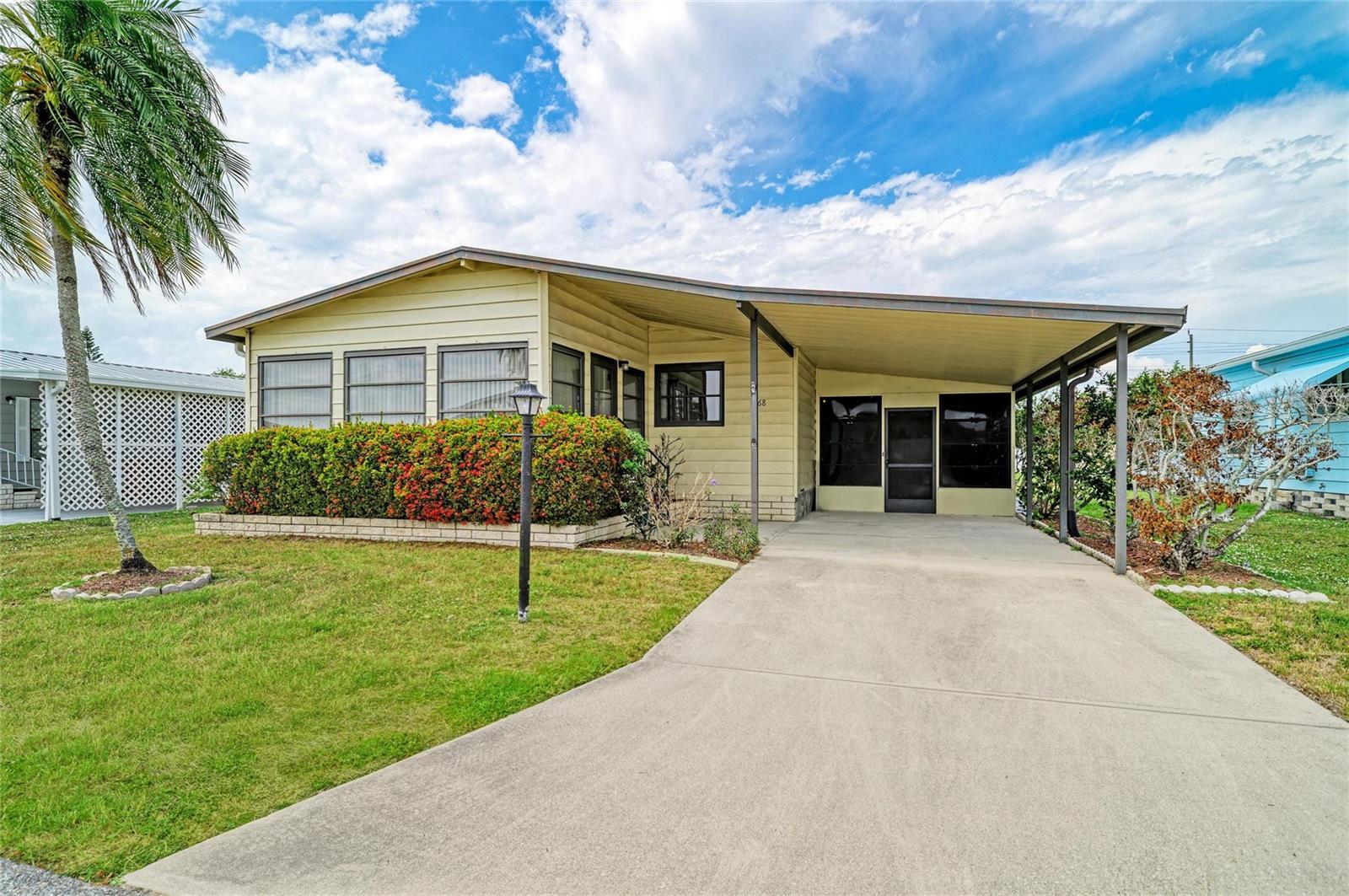 Welcome to easy Florida living in the desirable Shadow Brook Mobile Home Park! This well-maintained 2-bedroom, 2-bath home offers comfortable and affordable living in a rare all-ages, land-owned community. Inside, you’ll find a spacious layout plus an enclosed Florida room — the perfect space for relaxing, entertaining guests, or enjoying your morning coffee year-round.Bring your imagination and make this property your own!

Residents of Shadow Brook enjoy a variety of community amenities including a sparkling pool, clubhouse, and shuffleboard courts, creating an active and friendly neighborhood atmosphere. Quarterly HOA dues of just $650 include water, sewer, trash, and basic cable, helping keep monthly expenses simple and predictable. Conveniently located near shopping, dining, schools, and easy access to nearby beaches and highways, this property is a fantastic opportunity for full-time residents or seasonal owners