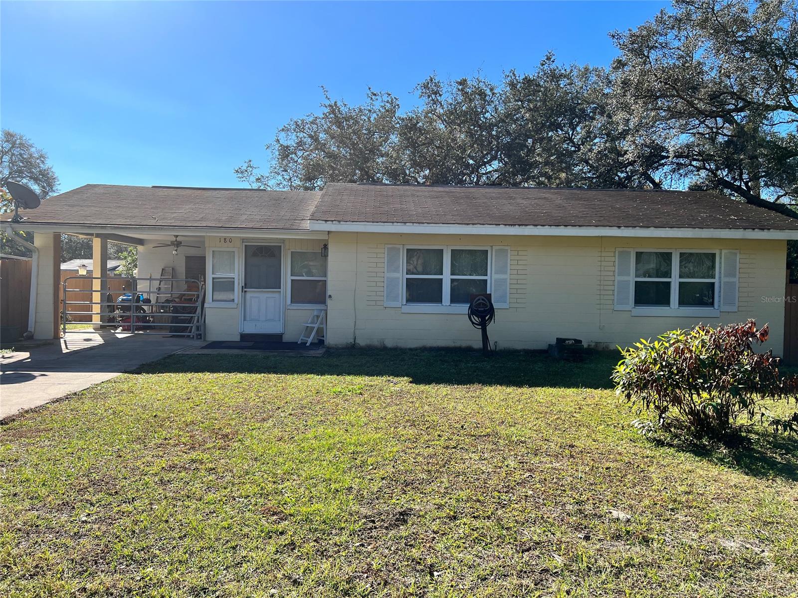 Solid block built 2/1 on quiet Orange City street. Home has had roof replaced 2/2023. All original windows have been replace with white vinyl windows. Inside utility room with washer/dryer hook ups.  Floors are tile and some original pine. Large fenced yard with mature fruit trees (lemon, tangerine, peach, starfruit). Metal storage building 16'x10' provides ample storage. All mechanical systems working properly. ;Water: City