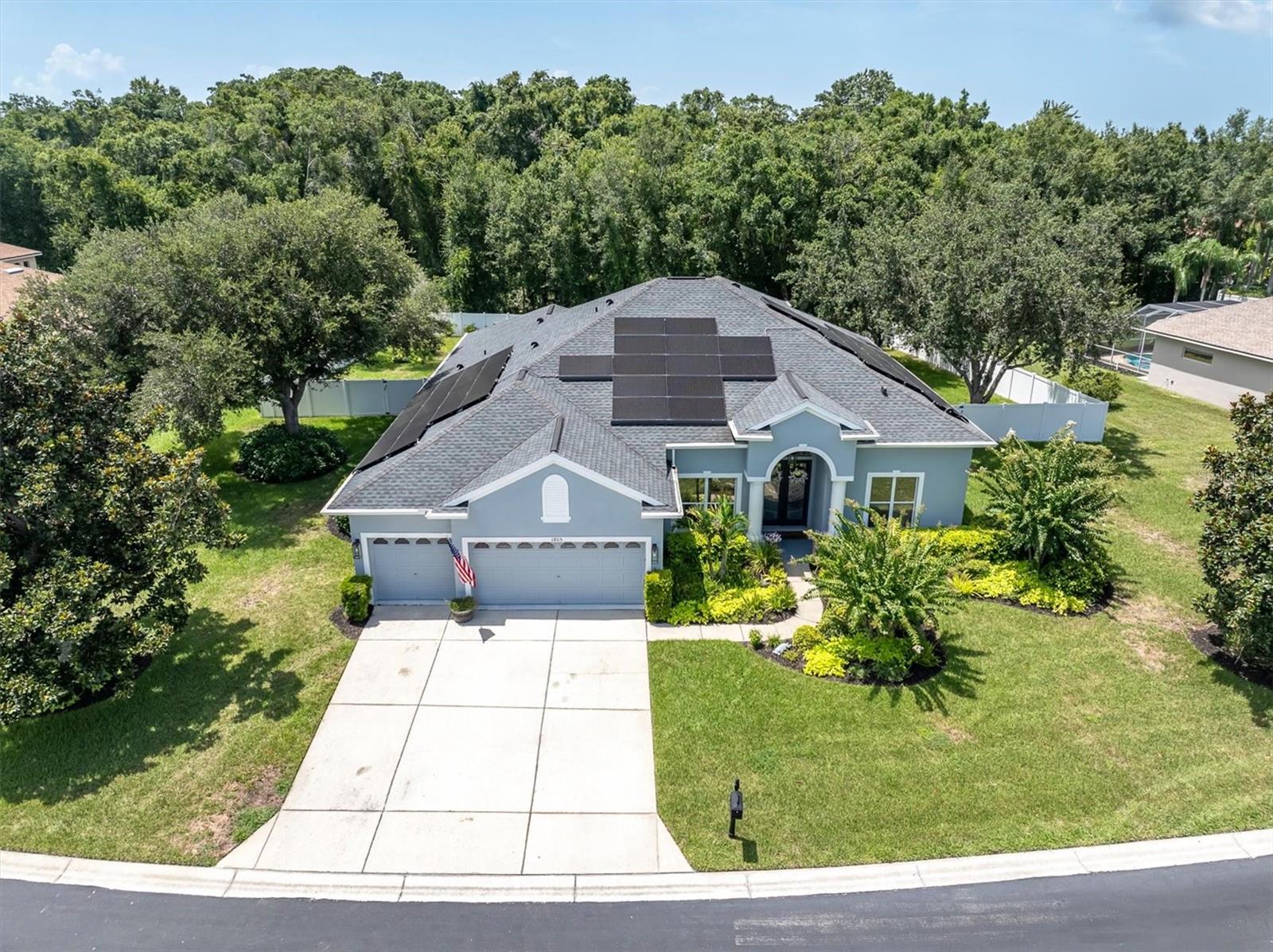 Waterfront Elegance in the Heart of Trinity – Gulf Access Community with NO Flood Insurance Required!
Welcome to your Florida dream home in one of the most sought-after GATED communities in 34655 where luxury, privacy, and an active waterfront lifestyle come together. Positioned on a premium conservation homesite spanning over half an acre, this stunning property offers exceptional privacy, and breathtaking natural views.  This exceptional 5-bedroom, 4-bath, 3-car garage residence offers the perfect balance of elegance and everyday comfort.
One of the home's most valuable features is the PAID-IN-FULL solar system, providing incredible energy savings averaging approx $30 per month in electric costs.
As you step through the grand double-door entry, you'll immediately be impressed by the soaring 11-foot ceilings, abundant natural light, and thoughtfully designed tri-split floor plan. The beautifully updated kitchen features solid wood cabinetry, stunning countertops, stainless appliances, and a custom pantry.
The expansive second-floor bonus room is complete with its own full bath and walk-in closet. This versatile space is perfect as a private guest suite, game room, home theater, fitness room, or multigenerational living space, giving you endless possibilities to fit your lifestyle. Step outside and prepare to fall in love with your own private backyard oasis. The owners have invested over $150,000 in upgrades since purchasing the home, creating an outdoor retreat that rivals a luxury resort. Enjoy the new heated saltwater pool with sun deck and fountain surrounded by approx 1,400 sq ft of stunning travertine decking, an extended covered aluminum patio, outdoor bar and grilling area, storage shed, and beautifully landscaped grounds.
Additional updates include a roof only four years old, both HVAC systems replaced in 2021, updated bathrooms, kitchen updates, new cooktop and microwave, new water softener, smart home lighting, hardwired exterior lighting, epoxy garage flooring, built-in garage shelving, and numerous additional enhancements throughout the home.
Outdoor enthusiasts will appreciate the community's private boat ramp with direct access to the Anclote River and Gulf of Mexico, making it easy to spend your days boating, kayaking, fishing, or exploring Florida's beautiful waterways. Residents also enjoy a private fishing pier, playground, park, gated entrance, low HOA fees, NO CDD, and NO flood insurance requirement—a rare combination for a waterfront-access community.
Zoned for highly rated schools, making it an exceptional choice for families and resale value. Located within minutes of top-rated restaurants, shopping, hospitals, golf courses, scenic bike trails, and only about 15 minutes from the Gulf beaches, this home truly offers the best of Florida living. 
Opportunities like this are rare—schedule your private showing today and experience the Florida lifestyle you've always dreamed of.