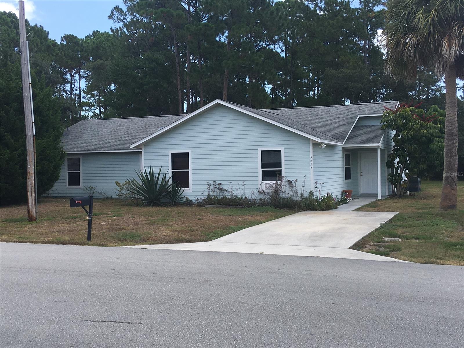 Quiet & Cozy 3 bedroom, 2 bath duplex.  Has tile floors and detached utility shed with washer & dryer hookups.  Nice quiet area and large back yard.
