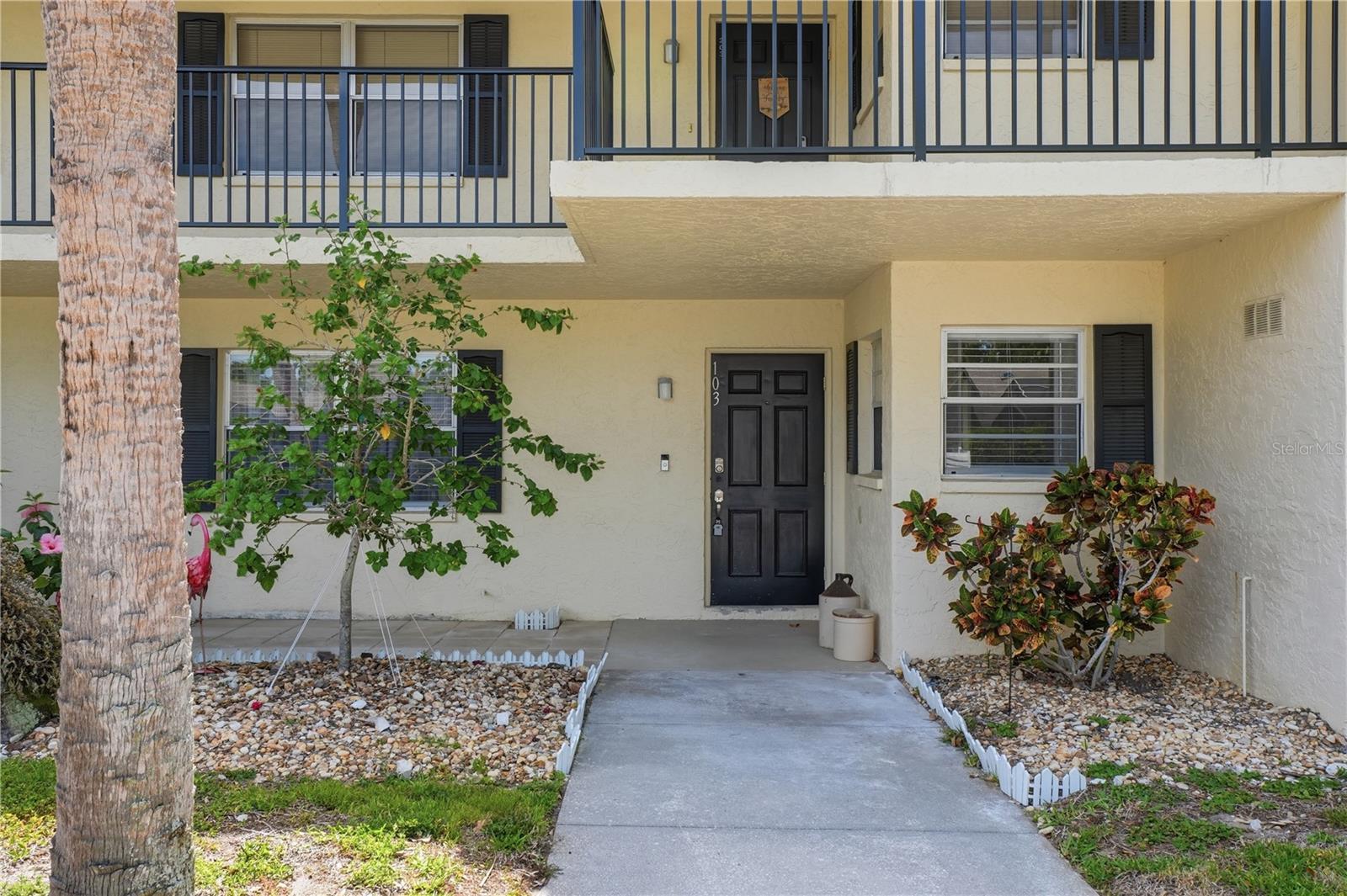 One or more photo(s) has been virtually staged. Welcome to this charming and completely move-in-ready first-floor condo in the desirable Palm Aire Country Club community, where comfort, convenience, and beautiful golf course views come together perfectly. This inviting 2-bedroom, 2-bath residence features a beautifully updated kitchen with crisp white shaker cabinetry, elegant stone countertops, and an open layout designed for easy everyday living and entertaining.

Enjoy peaceful mornings and relaxing evenings from your screened-in back porch overlooking the lush fairways and manicured greens, while the extended front sitting patio provides an additional cozy outdoor space to unwind and enjoy Florida’s beautiful weather. Being located on the first floor offers easy accessibility with no stairs to climb, along with convenient access to the open green space and yard area just outside your door.

Located within the sought-after Palm Aire Country Club community, residents enjoy a beautifully maintained setting with optional golf and social memberships available, all while being just minutes from shopping, dining, entertainment, UTC, and the Gulf beaches. Whether you are looking for a full-time residence, seasonal getaway, or low-maintenance Florida retreat, this charming condo checks all the boxes. Come take a peek today!