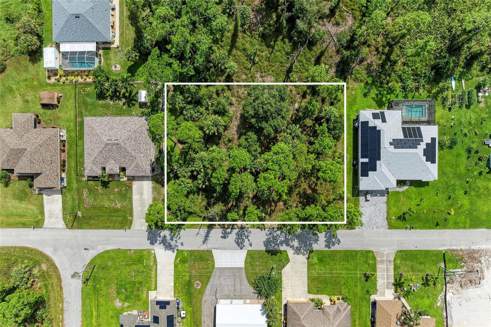 BUILDER READY OVERSIZED HALF ACRE DOUBLE LOT WITH ELECTRICITY ON SITE! Don’t miss this rare opportunity to secure a prime, buildable DOUBLE LOT (0.50+ acres) in the rapidly growing heart of North Port! This isn't just a homesite; it’s a "fast-track" project that allows you to save months of permitting and thousands in costs with ELECTRICITY ALREADY ON-SITE and a CLEAR SCRUB JAY STATUS according to Sarasota County records. Experience the ultimate freedom of NO HOA AND NO CDD FEES in a preferred NON FLOOD ZONE (X-Zone) that sits high and dry, allowing you to build your custom dream estate or a high-yield Airbnb without restrictive timelines or monthly dues.You are perfectly positioned just minutes from the vibrant energy of WELLEN PARK and the world-famous healing waters of WARM MINERAL SPRINGS. This location offers unbeatable convenience, being just 4 miles from the Port Charlotte Mall, movie theaters, and elite dining, and only 3 miles from the Coco Plum shopping center. For the outdoor enthusiast, you are only 10 miles from the Port Charlotte Beach Park and a short drive to the pristine sands of Venice and Englewood beaches. Whether you are a builder looking for a high-value project or a homeowner ready to design a massive private retreat with room for all your toys, this property is PRICED TO SELL and ready for its new owner. BUY, BUILD, AND ENJOY THE FLORIDA LIFESTYLE TODAY! (Local builder referrals available upon request).