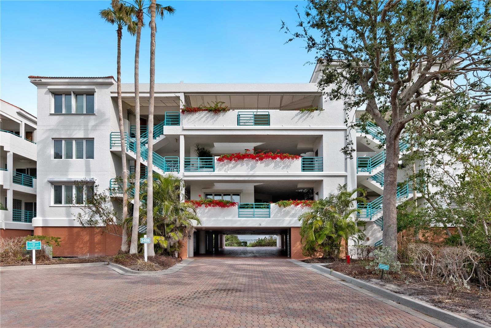 Your Longboat Key oasis awaits! This totally renovated 3bdrm 2.5 bath condo offers a open concept living space with high ceilings and walls of glass allowing sweeping views os Sarasota Bay. Light and bright material selections mix modern luxury with a coastal theme.
The gourmet kitchen features white soft close custom cabinetry, sleek glass doors, quartz countertops, mother of pearl backsplashes and new stainless steel appliances. The open and inviting great room/dining room features separate wine coolers for varieties, a bar with open glass shelves and a cozy linear gas fireplace.
The primary retreat offers luxury and seclusion with sliding doors onto the bay front lanai: a perfect place to watch the sunrise over the Sarasota skyline and enjoy playful dolphins and soaring seabirds. There is abundant walk in closet space customized by California Closets. The bath features a stand alone soaking tub and marble spa shower.custom cabinets, make up vanity, dual sinks and sparkling chandeliers complete the carefully curated mix of luxury and livability.
The en suite guest bedroom features an open spa shower affording vacation style comfort to your guests. The third bedroom/office includes a wall of glass with retractable shade allowing for versatility of use.
Notable home features include fine detail is such as wide plank LVT flooring throughout, 8’ solid mahogany doors with Emtek hardware, level five drywall finish, custom trim and millworker, LED recessed lighting, designer chandeliers, new high impact hurricane windows and sliders, and electric hurricane shutters throughout for peace of mind. Unique amenities include an attached oversized two car garage, an expanded courtyard off the kitchen with a seating area and your OWN gas grill. Residents have exclusive access to the Bay Isles Beach Club as well as on site amenities including a resort style pool, tennis, pickleball, exercise room, kayak SUP launch, and fishing dock. Perfectly situated in the southern most bayfront location on Longboat Key next to Quick Point Preserve, it is an easy walk to marina, restaurants,St. Armand’s and the LBK Club