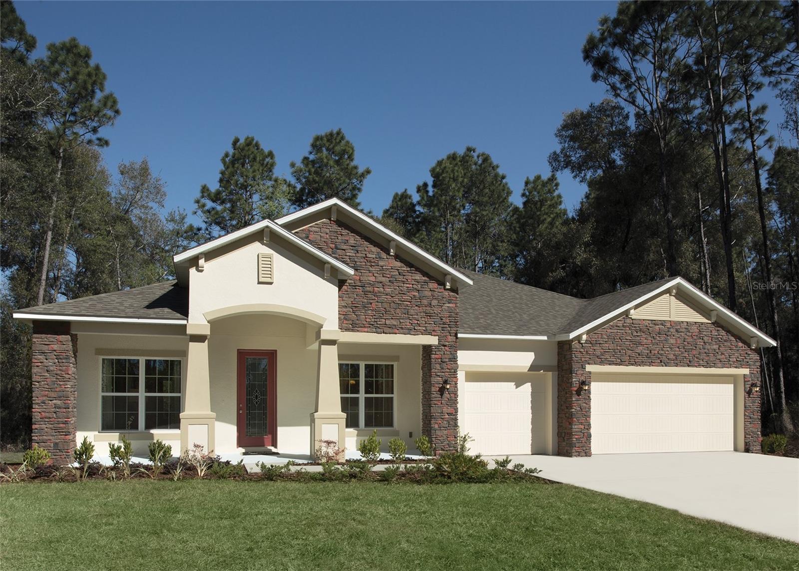 Pre-Construction. To be built. Elegance and comfort come together beautifully in the Sienna at Sugarmill Woods, thoughtfully designed with upscale finishes, smart functionality, and peaceful greenbelt views with no rear neighbors. Set on a landscaped homesite with irrigation, this stunning residence showcases stone accents, an oversized driveway, and an impressive 8' glass inlay front door that creates a striking first impression. Inside, soaring 11' ceilings, crown molding, deluxe interior trim, custom interior paint, and brushed nickel lever door hardware elevate the home’s refined style from the moment you enter.

The spacious foyer leads to a formal dining area and a private den with French doors, creating the perfect setting for a home office, library, or quiet retreat. The open great room is filled with natural light and enhanced by additional LED lighting, seamlessly connecting to the gourmet kitchen and breakfast nook for effortless everyday living and entertaining.

Designed with both beauty and functionality in mind, the chef-inspired kitchen features quartz countertops, solid wood soft close cabinetry, a subway tile backsplash, under cabinet lighting, stainless steel appliances, an ENERGY STAR French door refrigerator, wine cooler, and an oversized island that serves as the centerpiece of the home. EVP flooring throughout the main living areas adds warmth and durability, while plush carpet provides comfort in the bedrooms.

The luxurious primary suite creates a relaxing retreat with generous space, added LED lighting, a large walk-in closet, and a deluxe primary bath featuring ceramic tile shower walls, upgraded finishes, and spa-inspired details. Secondary bedrooms each include walk-in closets, providing flexibility and storage for guests or additional living needs.

Step outside to the covered lanai with an acrylic finish, where the protected greenbelt backdrop creates a peaceful outdoor setting perfect for morning coffee or evening gatherings. A spacious 3-car garage adds convenience and extra storage space.

Additional upgrades include a complete laundry package, Deako Smart Switches, Smart Thermostat, Ring Video Doorbell, and Keyless Entry Smart Door Lock for enhanced comfort, security, and energy efficiency. Backed by a full builder warranty, this exceptional home combines luxury, privacy, and modern convenience in one remarkable setting.