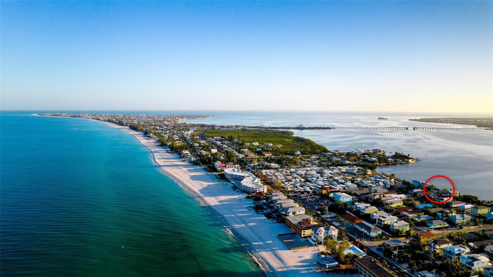 One of the most compelling bayfront opportunities on Anna Maria Island. Offering nearly 100 feet of direct Sarasota Bay frontage, this exceptional property combines breathtaking open-water views, a private 75-foot composite dock with boat lift, and city-confirmed potential for two luxury waterfront homes. Whether envisioned as a private estate or a premier redevelopment opportunity, properties of this caliber are exceptionally rare.