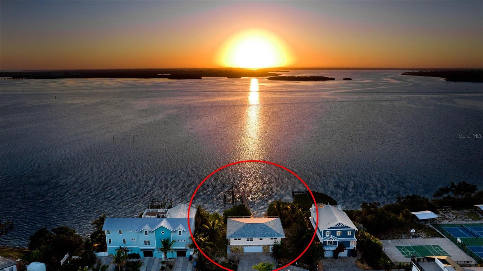 CONFIRMED POTENTIAL FOR TWO BUILDABLE WATERFRONT LOTS creates one of the most compelling redevelopment opportunities on Anna Maria Island with nearly 100 feet of direct Sarasota Bay frontage.

Privately owned by the same family for decades, this exceptional bayfront property offers expansive open-water views, a coveted location in the heart of Bradenton Beach, and the opportunity to create two luxury waterfront residences or an extraordinary private estate. The City of Bradenton Beach has confirmed the property's potential for two buildable waterfront lots, presenting a rare opportunity for builders, developers, investors, or those seeking to create a legacy property.

The existing property features a 75-foot composite dock and 4,500-pound boat lift, providing immediate boating access to Sarasota Bay and beyond while future plans take shape.

Waterfront parcels of this size, width, and potential are becoming increasingly scarce on Anna Maria Island. Whether your vision is two exceptional custom homes, a multi-generational family retreat, or a landmark bayfront estate, this is an opportunity to secure one of the island's most remarkable waterfront offerings.