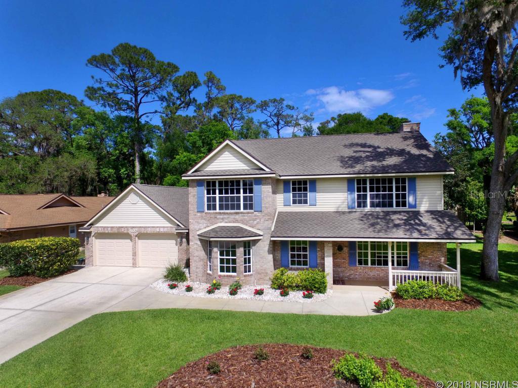 Immaculate move-in condition 4-bedroom home with beautiful landscaping in the heart of Port Orange! Tons of recent renovations and upgrades including roof (2017), flooring (2016), granite counters (2014), kitchen appliances, window treatments, interior paint, LED lighting, fixtures, water heater and more. First floor features separate living and family rooms, formal dining room, huge eat-in-kitchen, inside laundry room and oversized 2-car garage. Kitchen has tons of storage space between the many cabinets with undermount lighting and walk-in butlerâs pantry plus large storage closet. Kitchen island has a bar for extra seating and cooktop while the undermount kitchen sink has a beautiful view thru the large window into a lush backyard. Central vacuum system makes keeping this home clean super easy. Enjoy the wood burning fireplace in the winter and the spacious screen porch in the summer. Porcelain tile and hardwood flooring make the first floor beautiful while carpet upstairs make for comfortable living. Master suite features two walk in closets with high-end organizers, pocket doors and a double vanity bathroom with both walk-in shower and jetted garden tub. The 5-zone irrigation system helps keep the extensive landscaping perfect year around and the large private backyard is just like a park. There is a storage shed for extra gear and even an outside shower. This home has beautiful curb appeal with window casings and grilles. The River Oaks subdivision is in the perfect location for great schools, restaurants, shopping and public parks. ;Water: City