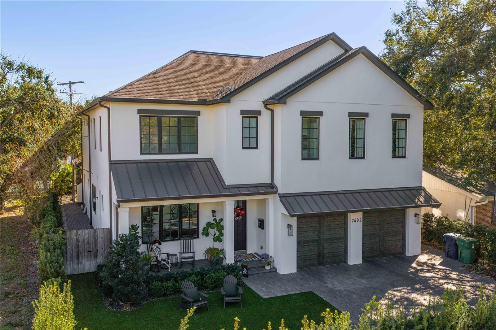 Under contract-accepting backup offers. Welcome to your dream home in the highly sought-after Parkland Estates—where luxury, privacy, and location come together seamlessly. Tucked away at the end of the street steps away from the charm of Parkland Estates with two large Greenland parks within a block.  This exceptional 5-bedroom, 5-bathroom custom pool home offers the perfect blend of elegance and functionality.  The floor plan was well thought out and designed to invite you into large rooms and spacious hallways, while the décor and lighting offer the warmth you want to call this your home. From the moment you step inside from the front porch to enjoy the Parkland Estates neighborhood, you’re greeted by a stunning two-story foyer flooded with natural light, setting the tone for the thoughtfully designed interior. High ceilings engineered hardwood flooring, and electronic shades throughout create a bright, cohesive, and effortlessly refined living space. Just beyond the entry, a main-floor bedroom and full bath provide flexibility for guests or multi-generational living. Continue down the hall and you’ll find the heart of the home—an expansive open-concept kitchen and living area designed for both everyday comfort and upscale entertaining. The chef’s kitchen is truly one of a kind, featuring double islands with marble countertops, three faucets, and a show-stopping La Cornue gas range and hood imported from France with a pot filler and built-in double door oven.  Premium appliances include a Sub-Zero refrigerator, a full-size Sub-Zero wine cooler, and an additional Sub-Zero fridge with double freezer drawers, and Wolfe wall oven that are all located in the walk-in pantry. A stylish coffee bar adds the perfect finishing touch. Downstairs off the full bath offers the 5th bedroom that is being used as a children’s retreat with barndoors. Upstairs, you’ll find three additional bedrooms plus the primary suite, each equipped with their own en-suite and large walk-in custom-built closet systems. The oversized primary suite is a private retreat, complete with two large walk-in closets featuring custom built-ins and a spa-like bathroom showcasing a separate soaking tub and walk-in shower. A spacious laundry room with two washers and two dryers adds everyday convenience. Outside, your personal backyard oasis awaits. Designed for year-round enjoyment, the outdoor space features a covered patio, a screened-in pool and spa, a cozy outdoor fireplace, and a fully equipped outdoor grill—perfect for entertaining or relaxing in style. Both the front and back yards boast low-maintenance turf landscaping, ensuring Pristine curb appeal without the upkeep. Location is everything. This home sits in the tight-knit community of Parkland Estates, known for its high-end homes and multiple parks. You’re within walking distance of vibrant SOHO (South Howard Avenue), which features restaurants such as the Iconic Bern's Steak House, Daily Eats, The Landon, shops, and conveniences. A short walk, bike ride, or quick drive puts you in Hyde Park Village for high-end dining and shopping. You’re also just moments from Tampa’s iconic Bayshore Boulevard for scenic walking, running, and waterfront exercise.