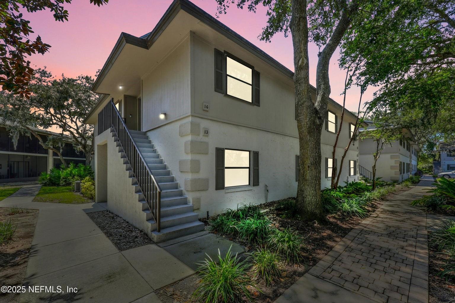 One or more photo(s) has been virtually staged. Tucked away on a quiet cul-de-sac in St. Augustine Shores, this 2-bedroom, 2-bath home offers a comfortable and welcoming layout. The open floor plan features a bright living area, dining space, and a well-appointed kitchen with plenty of storage. The primary suite includes a walk-in closet and private bath, while the split design provides added privacy for the additional bedrooms. Upstairs corner unit with a screened-in balcony overlooks the pool just steps away. Relax on the screened lanai overlooking the fenced backyard. Community amenities include a pool, clubhouse, golf course, Riverview Club, walking trails, and a fishing pier - all with low HOA fees and no CDD!