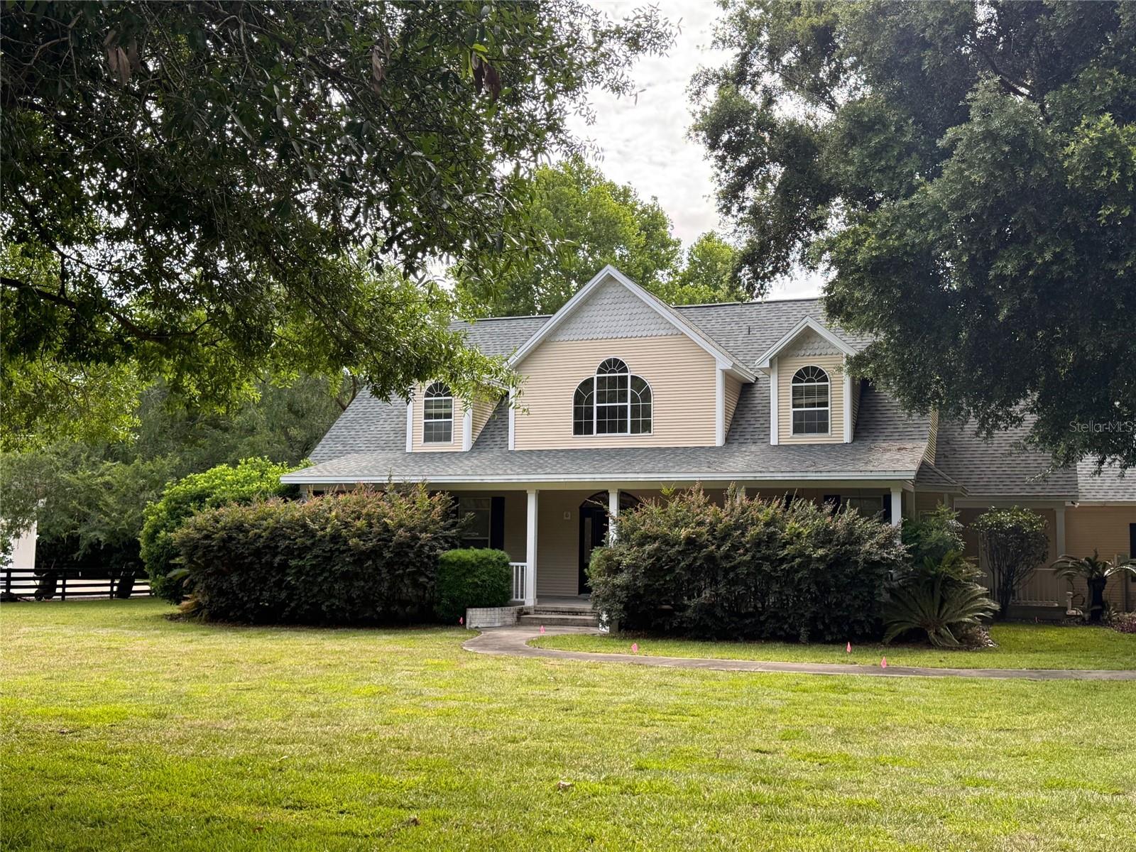 ~SMALL, PRIVATE GATED COMMUNITY~ ~CLEAN SLATE - CREATE YOUR OWN DESIGN~ ~CUL-DE-SAC~ ~HORSE PASTURE VIEW~ ~POOL~ ~2022 ROOF~ ~2018 CARRIER HVAC~ ~BRAND NEW SOD~ 
Originally a 3,460 square feet, 2-story home with attached garage is now ready for YOU to become the artist, designing your own retreat. 
You could choose your exterior theme: Mid-Century Modern, Deep South, Craftsman? Add a garden...grow citrus trees. Want a customized primary suite or two? Would generous work and storage space in your updated kitchen be appealing? Maybe double wall ovens will advance your cooking/baking prowess? Or how about adding a wet bar with wine fridge or butler’s pantry? Would you enjoy an entertaining space spilling onto your lanai with pool, watching the polo ponies graze? Need a puzzle/game area? How about a cozy snuggling fireplace? Are TV/movies with recliners your thing? Bring in your own design team or use the creative contractor who has begun the project. Glen Hollow Farms grants easy access to the vibrant lifestyle of The Villages. Drive your golf cart from this quiet neighborhood anywhere in The Villages. This is truly Florida living at its finest. Located off Hwy 466, Glen Hollow Farms is close to the Polo Fields and is a short drive to shopping, dining, and medical in Southern Trace and Laurel Manor. Nearby Arnold Palmer Legends Championship Golf Course offers non-resident rates.