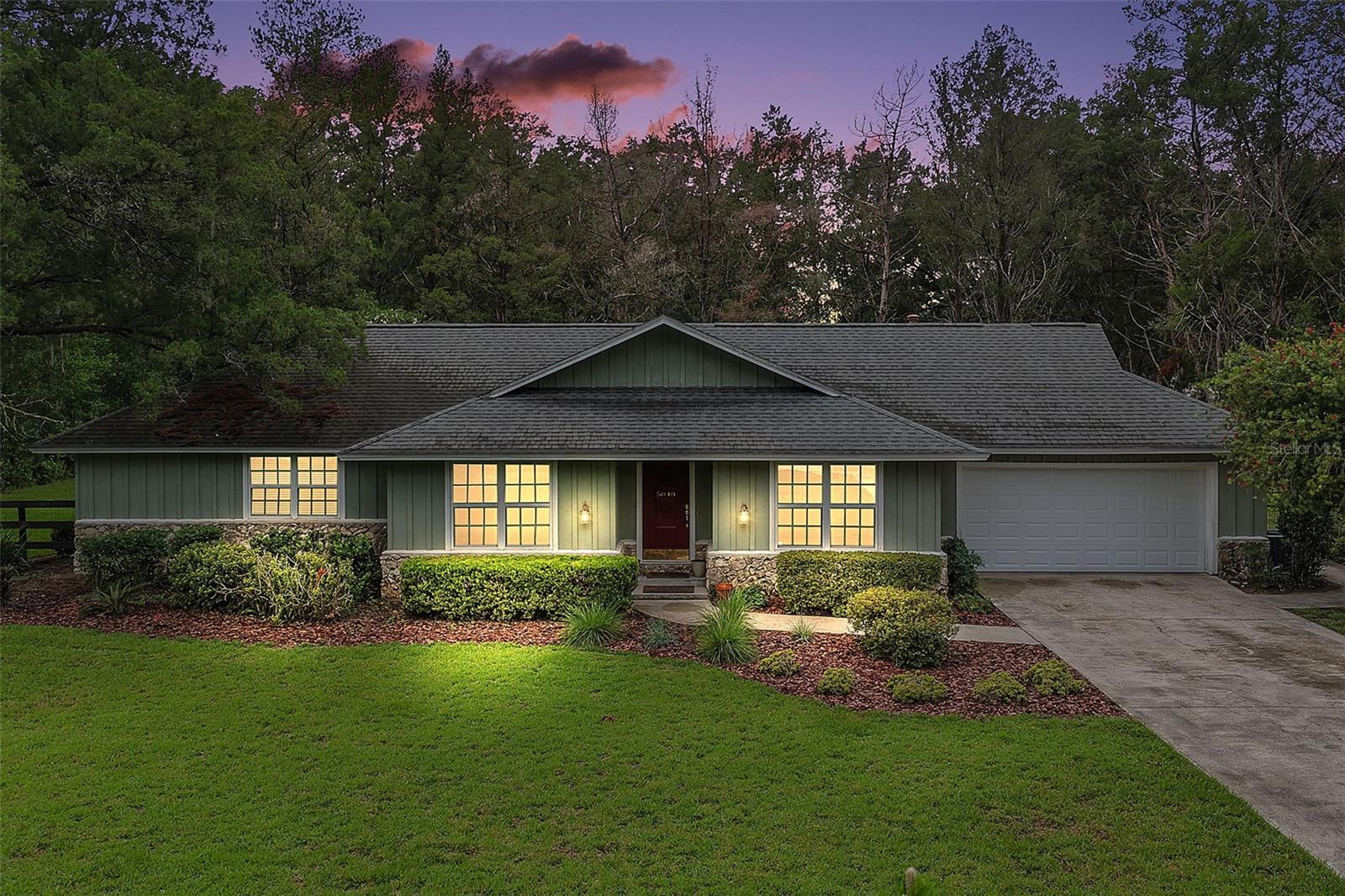 Nestled in the quiet, neighborhood of Huntington, this is a rare opportunity to own a beautifully maintained property on a picturesque one-acre lot. Enjoy mature, oversized trees, professional landscaping, and plenty of space to relax and entertain.  This home features a remodeled bathroom and numerous upgrades, including: New water heater (2026), New garage door and opener (2025), New well pressure tank (2025), Reverse osmosis water filtration system (2025).  Don't miss your chance to own this home in a beautiful location.