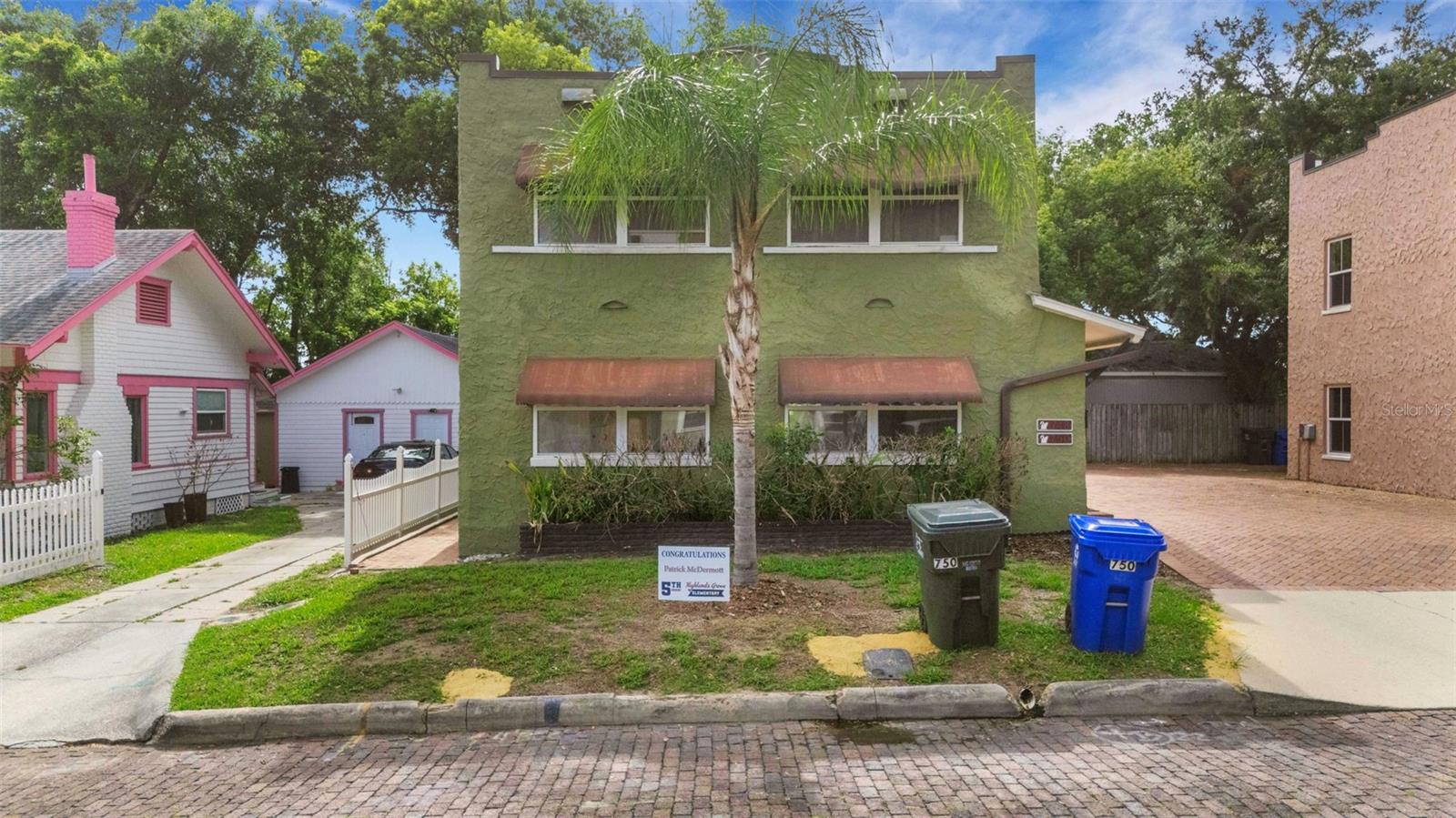 Great opportunity in the desirable Lake Morton Historic District! Originally built in 1925, this charming two-story duplex blends historic character, in-town convenience, and excellent income potential in one of Lakeland’s sought-after locations. Whether you are seeking an owner-occupant opportunity, multigenerational living, or an investment property, this unique duplex offers flexibility and timeless appeal. Unit 750, located on the second floor, is currently leased, lease ends 9/30/2026.

Ideally located near Lake Morton, Lake Mirror,  Lake Hollingsworth, Florida Southern College, downtown Lakeland, The Ashley Gibson Barnett Museum of Art, Lakeland Public Library, coffee shops, restaurants, shopping, and more, this property places you in the heart of Lakeland’s vibrant historic district lifestyle.

Offering approximately 2,224 total square feet of living area, with approximately 1,112 heated square feet per unit, each residence features private side-front and rear entrances, separate utility and water meters, tankless hot water heaters, and charming historic details paired with thoughtful updates.

Unit 748 is filled with character and warmth, highlighted by a spacious 9x21 enclosed sunporch with abundant windows, A/C, and charming terracotta-style tile flooring, creating the perfect bonus living space for relaxing, reading, a home office, or entertaining. Inside, formal living and dining rooms showcase beautiful wood flooring and timeless architectural charm. The updated kitchen features white wood cabinetry, granite countertops, stainless steel appliances, and a stackable washer and dryer conveniently located within a versatile utility/mudroom offering additional storage space.

The unit offers 2 bedrooms and 1 bathroom, including a generously sized bedroom with a large walk-in closet. Outside, a spacious brick terrace provides valuable off-street parking along with room to create inviting outdoor seating or entertaining areas.

Whether you are looking for a historic in-town residence, investment opportunity, or flexible live/work lifestyle, this unique property delivers charm, convenience, and versatility in one of Lakeland’s most desirable historic neighborhoods.