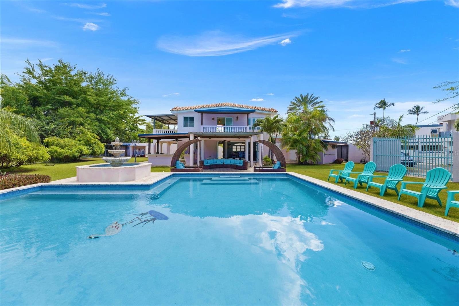 Location, Location, Location!
Experience coastal luxury in this 3-bedroom, 4-bathroom quintessential beach house featuring an open floor plan that seamlessly blends indoor and outdoor living. Enjoy direct beach access to the stunning Lalas beach, known for its calm waters and incredible sunsets.   The spacious living area flows effortlessly into the gourmet kitchen and dining spaces—perfect for entertaining, relaxing with family or investment.  Step outside to your private paradise, complete with an amazing pool, swim-up bar, and lounge area designed for ultimate comfort and style.

Currently the home is a lucrative rental property that generates just under $200k annually.   Whether you’re hosting guests or looking for your own personal retreat, this home offers the perfect balance of modern design, coastal elegance, and resort-style amenities.  Located in the exclusive Sea Beach Colony neighborhood on a 1,346 sm corner lot, fully gated & secure with no neighbors on either side.  Home offers full back up power and water reserves.  Qualified buyers contact us today!  The location cannot be beat!