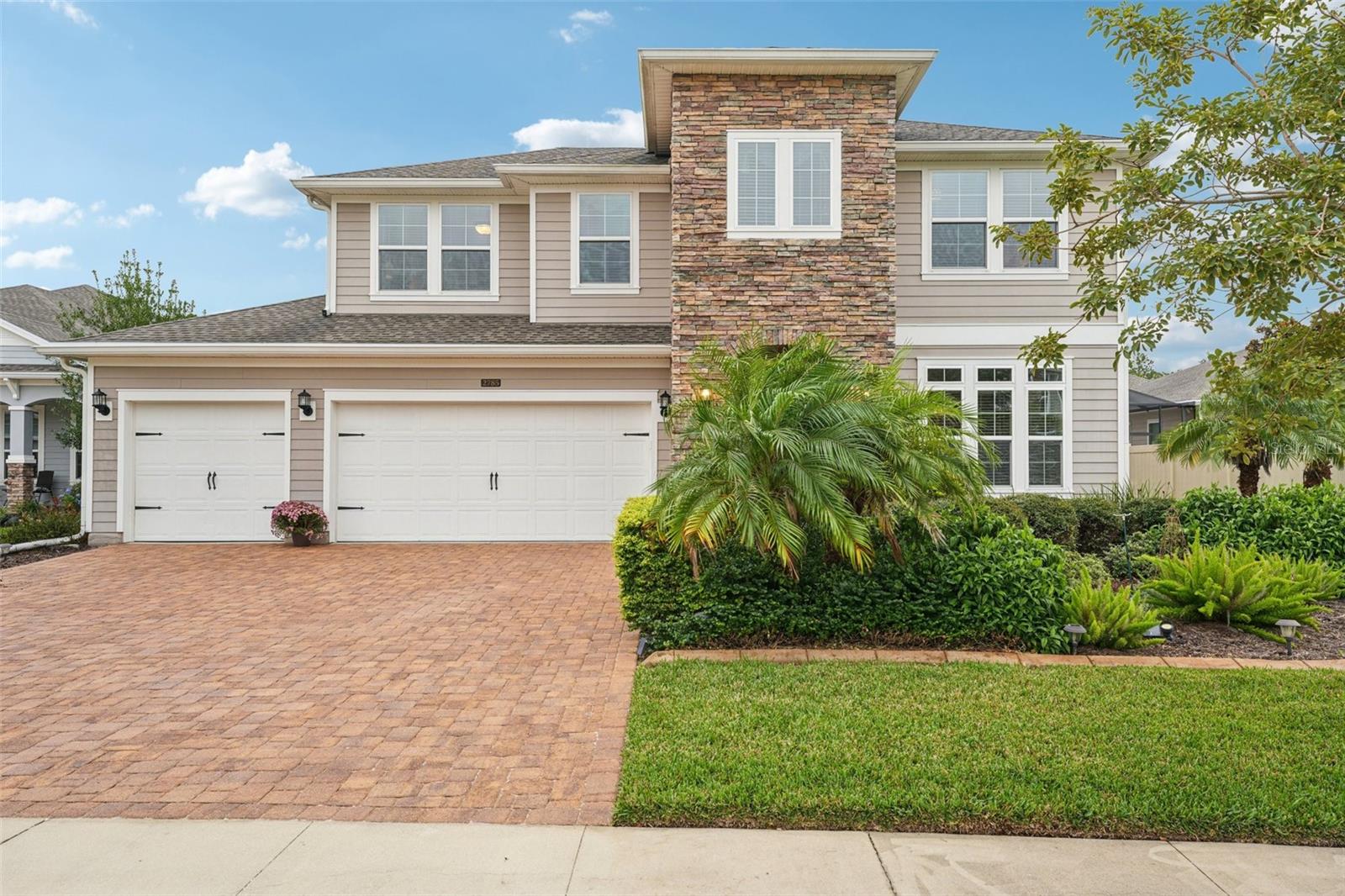 5 Bedrooms with 4 Full Bathrooms and an extended 3-car garage with a beautiful location. Situated on a peaceful pond/water view lot the home features a brand-new fenced in backyard, and an oversized screened lanai with extended paver patio overlooking the water, BBQ Area and more room for a pool. Designed for both everyday living and entertaining, the kitchen features quartz countertops, a butler's pantry with custom built-ins, and a 2nd pantry closet with abundant cabinetry in the kitchen, updated lighting, and a large crescent-shaped island with additional seating. Wood-like Tile flooring runs throughout the main living areas, with carpet in the bedrooms. The thoughtfully designed floor plan includes the primary bedroom on main level along with a 2nd bedroom and full bathroom, ideal for guests or multi-generational living. Formal dining room greets you near the Grand Foyer entrance. Upper level includes 3 additional bedrooms, two full bathrooms, 1 bedroom with an ensuite and a dedicated office/study (Tech room) area. All bathrooms have been updated with tiled showers and modern finishes. Beyond the home, Palencia offers one of the most desirable lifestyles in St John's County. Residents enjoy access to resort-style amenities including community pools, a fitness center, clubhouse, pickleball an golf!