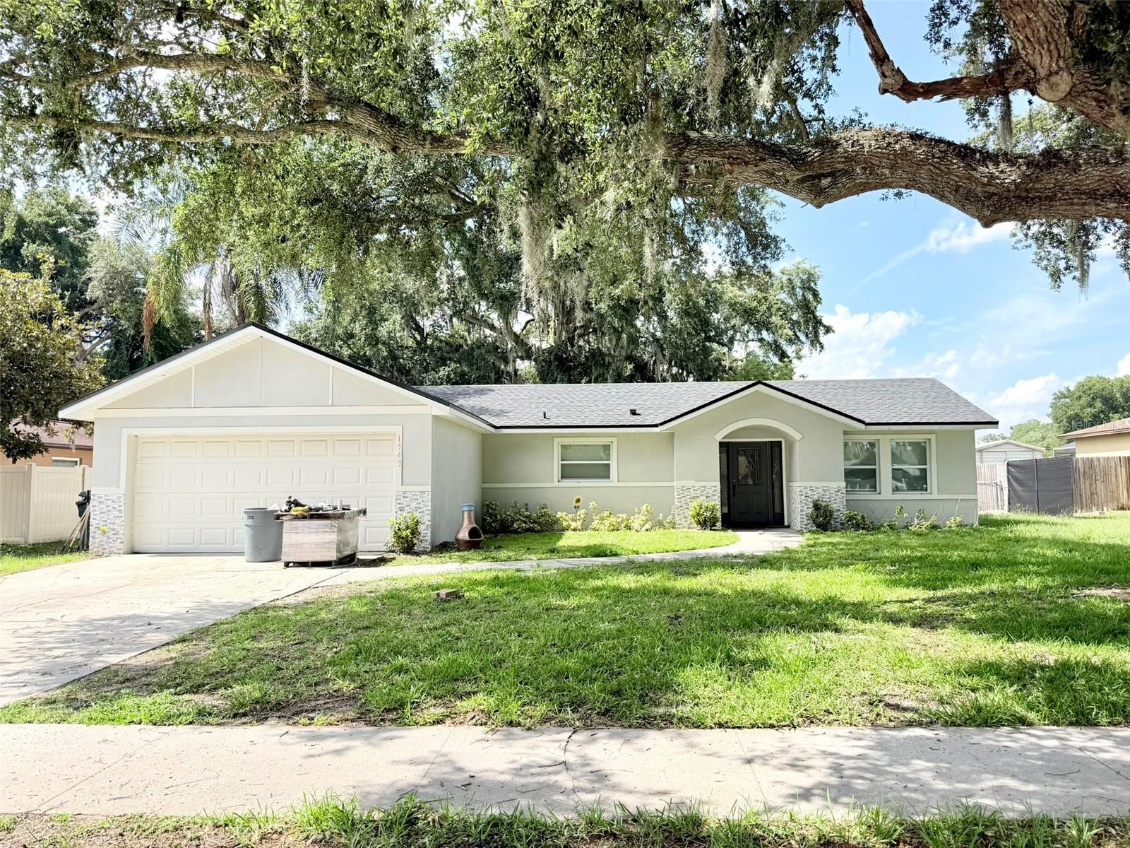 Amazing, completely rebuilt 4-bedroom, 3-bathroom single-family home with a private pool in the Heather Oaks community of Kissimmee. Updated with all city permits, this modern home features a bright open floorplan with porcelain floors throughout, solid wood cabinets, quartz countertops, and brand-new appliances. All spacious bedrooms are on the main floor, including a primary suite with a walk-in closet. Enjoy outdoor living in the massive 0.23-acre backyard featuring a concrete in-ground pool with custom lighting, perfect for family and friends. Additional highlights include a 2-car garage, inside laundry room, and an excellent location close to Valencia College, prime shopping, and community parks. Small pets are welcome. Ready for long-term lease!