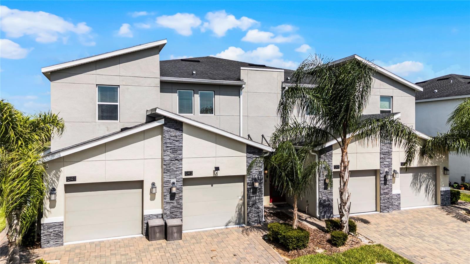 A proven income-producing short-term rental with consistently high occupancy rates, this beautifully maintained 3-bedroom, 2-bathroom condo in the highly sought-after ChampionsGate Resort offers an exceptional investment opportunity or the perfect vacation home. Sold fully furnished and completely turnkey, this property is ready for its next owner — or its next guests — from day one.

Step inside to a bright, inviting open-concept floor plan with a spacious living area perfect for relaxing or entertaining. The modern kitchen features stylish countertops, stainless steel appliances, and upgraded cabinetry. Each bedroom is thoughtfully designed for comfort, while the dedicated game room is a crowd favorite, complete with a poker table and two arcade games — perfect for family fun and memorable guest stays.

After a day at the parks, unwind on the private back patio with serene golf course views — the ideal spot for morning coffee, evening cocktails, or simply soaking in the Florida sunshine. When you're ready for more, step into the world-class amenities at the Oasis Club, including multiple pools, a lazy river, fitness center, movie theater, arcade, restaurant, tiki bar, and much more.

Best of all, the HOA fee covers high-speed internet, cable TV, daily valet trash service, exterior maintenance, and full access to the Oasis Club, delivering exceptional value and making ownership virtually hassle-free.

Whether you're looking to grow your investment portfolio or claim your own slice of paradise just minutes from Walt Disney World, this ChampionsGate gem delivers the perfect blend of strong rental performance, resort-style living, and low-maintenance luxury.