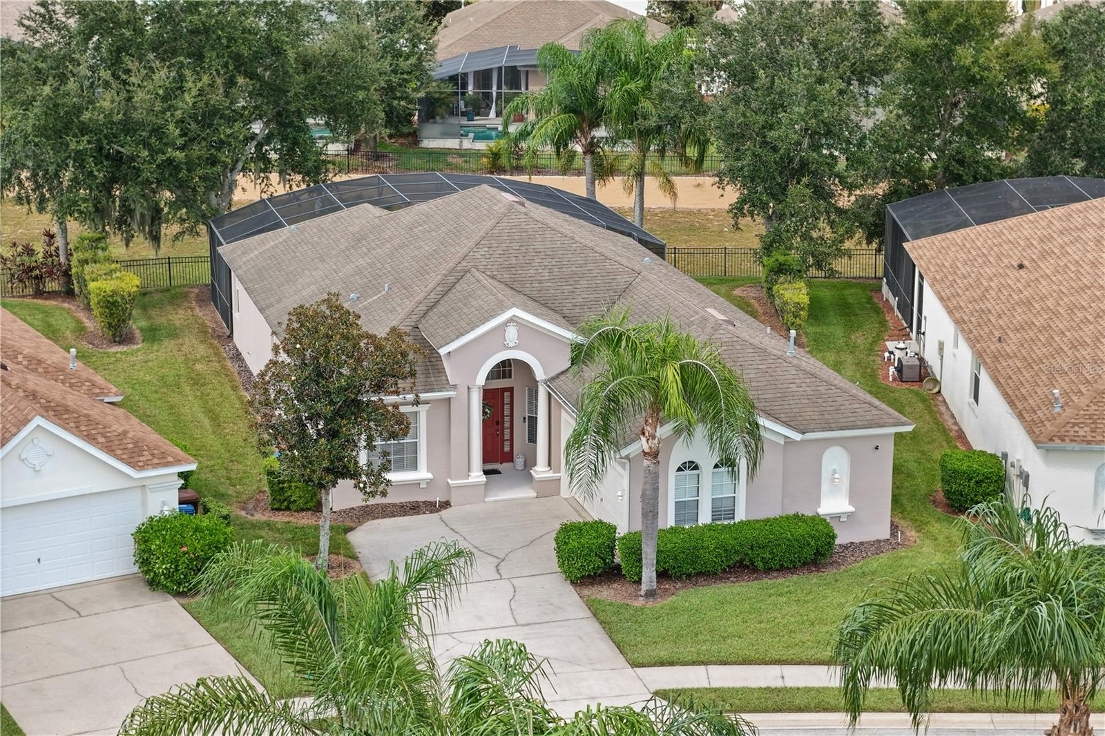 Welcome to your own Florida retreat in the sought-after, gated community of Calabay Parc at Tower Lake! This beautifully maintained, fully furnished 4-bedroom, 3-bath home offers the perfect blend of comfort, style, and investment potential.
The spacious open-concept floor plan is filled with natural light and features a desirable split-bedroom layout, including two private en-suite bedrooms—ideal for guests or multi-generational living. The primary suite offers direct access to the screened lanai, a large walk-in closet, and a spa-inspired bath with dual vanities, a soaking tub, and a separate shower.
Step outside to your private backyard oasis featuring a heated pool and spa, covered lanai, and no rear neighbors—perfect for relaxing or entertaining year-round.
Whether you’re searching for a primary residence, vacation getaway, or income-producing property, this home checks every box. Zoned for short-term rentals and Airbnb/VRBO-friendly, it offers exceptional flexibility for homeowners and investors alike. Additional features include a 2-car garage currently set up as a game room, an indoor laundry room, and access to community amenities including a private boat ramp, fishing dock, scenic walking paths, clubhouse, internet, and lawn maintenance.
Conveniently located near shopping, dining, golf, and Central Florida attractions including Disney and LEGOLAND, this is an outstanding opportunity to own a piece of the Florida lifestyle. Schedule your private showing today!