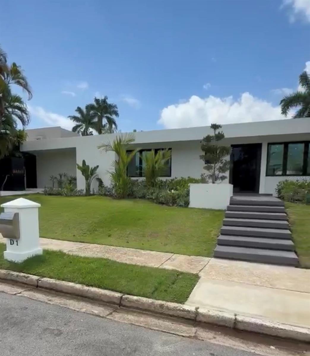 Located in the gated community of Garden Hills, this elegant residence offers a prime suburban lifestyle with 24/7 security. The home features a spacious, well-appointed layout spanning 3,177 sq. ft., comprising 4 Bedrooms, 3 Full bathrooms, and 2 Half Bathrooms. Designed for premier outdoor living and entertainment, the backyard boasts a swimming pool and a spectacular pergola equipped with a built-in BBQ, outdoor fridge, dedicated storage, and a functional sink/faucet setup. The property has a diesel generator.  Fully remodeled, kitchen fully equipped, partially furnished.  This cornered house perfectly combines luxury, comfort, and peace of mind in Guaynabo.