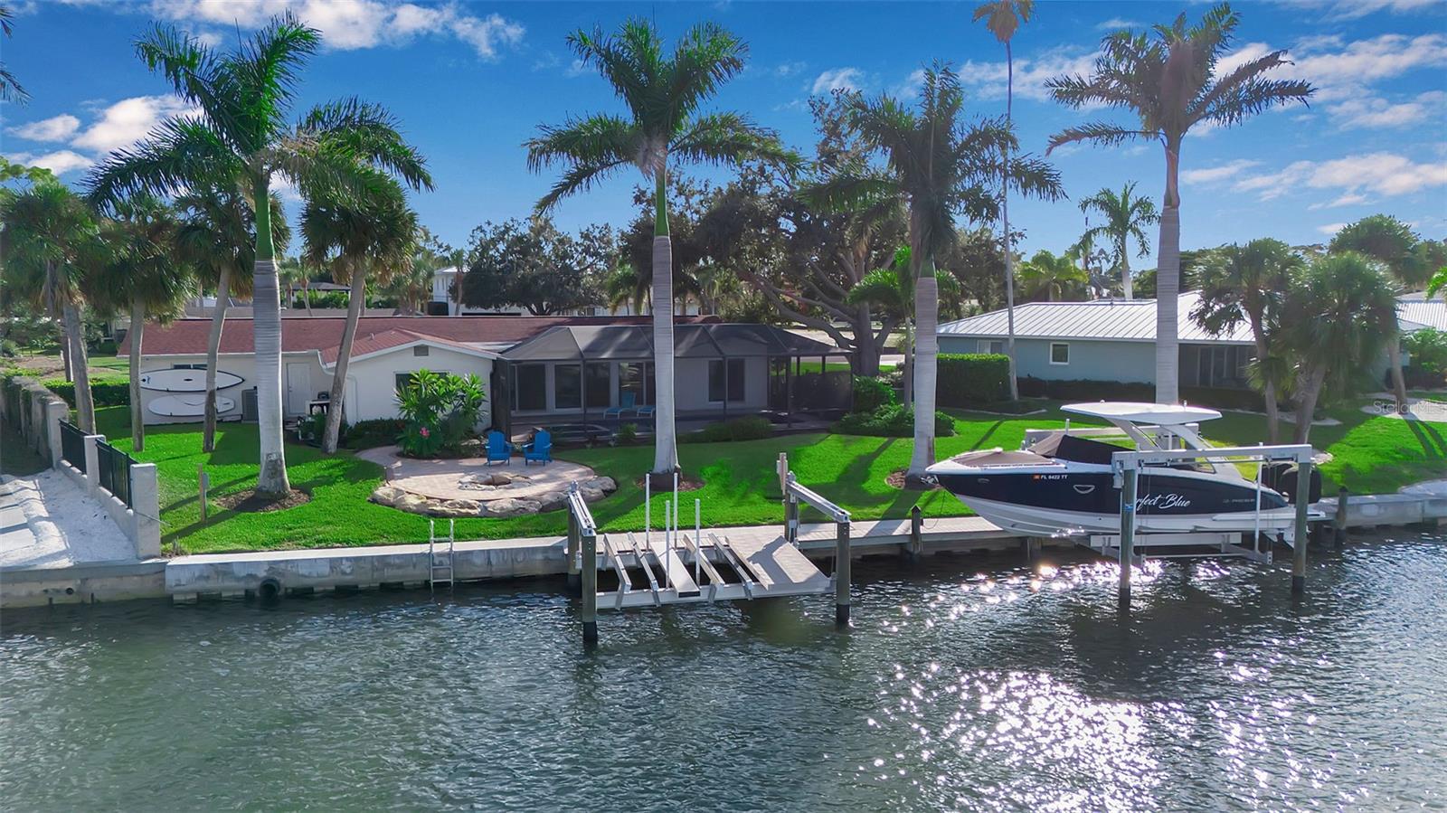 Discover a walkable paradise in the heart of historic Venice Island.
Tucked at the end of a private cul-de-sac, this move-in ready 4-bedroom, single-level home sits on the Intracoastal Waterway with sweeping views of Roberts Bay and just minutes by boat to the Gulf. Enjoy easy access to downtown Venice with shops, dining, and entertainment just a short stroll away.
The property features a new 2024 seawall, remote-controlled double jet ski/kayak lift, and a redesigned heated pool and spa overlooking the water—perfect for sunset views and entertaining.
Inside, the home was fully renovated (2017–2018) with a new roof, hurricane-impact windows and sliders, updated plumbing and electrical, new flooring, and modern systems. Additional updates include a new pool pump (2024) and fresh interior and exterior paint (2025).
With four bedrooms, 2.5 baths, and a bright, open layout, this home offers the ideal blend of comfort, convenience, and waterfront living.
Schedule your private showing today.