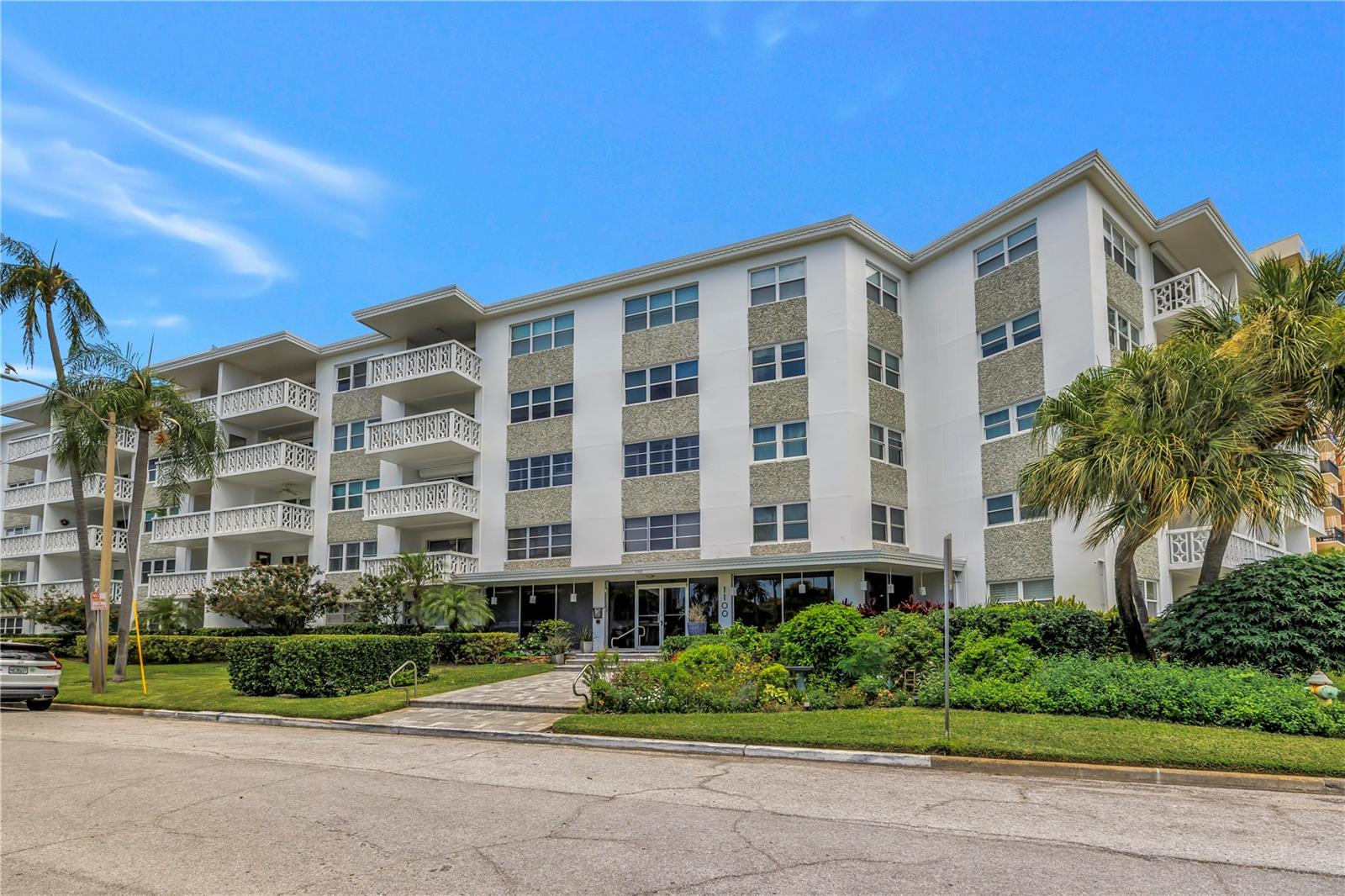 Here it is … a unique and rare opportunity to live on one of the most gorgeous drives in all of St. Petersburg. Welcome to Park Shore Condominium and 1100 North Shore Drive NE, right on the edge of both the highly sought after Old Northeast neighborhood and our bustling downtown. This iconic and charming mid-century-modern condominium building welcomes all ages and overlooks waterfront North Shore Park and is just steps to the winding sidewalks along sparkling Tampa Bay. Community tennis courts, fitness park, beach volleyball, world-class aquatic center, baseball field, dog park, The Pier, Vinoy Resort and the restaurants, shops and museums along fabulous Beach Drive are all just seconds away. This one bedroom, one bath unit offers 730 sq ft. of open floor plan living space. It is bright, spacious, updated, and has one of the lowest monthly HOA fees in the downtown area, at just under $400/month. This 3rd floor property has a spacious and oversized covered balcony that offers views of the park and Tampa Bay, and allows for the unit to be awash in natural light. The kitchen has been thoughtfully remodeled as well as the bath, an in-unit washer and dryer is right around the corner, and a private storage closet/space is directly across the hallway. The building provides secure keypad entry and a covered, private dedicated parking space near the elevator. A bright and private community room is available for meetings or gatherings and offers a kitchen perfect for catering needs. The milestone inspections are complete, the board and reserves are solid and no reported storm issues in 2024.  This is a fantastic opportunity for maintenance-free living in the heart of it all. Schedule your showing today!