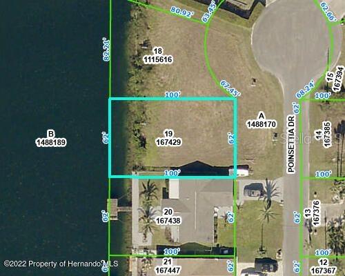 The seawall is in and the lot is cleared just waiting for the builder to start building your dream home on the water. 62 feet along the water located on a cul-de-sac lot. County water and sewer available for connection. The rear of the home will be facing the gulf where you can enjoy the beautiful views. lots of fun restaurants featuring great food and music nearby. Not far from lots of medical and shopping so its in a great location. Indirect gulf access. Come check it out.