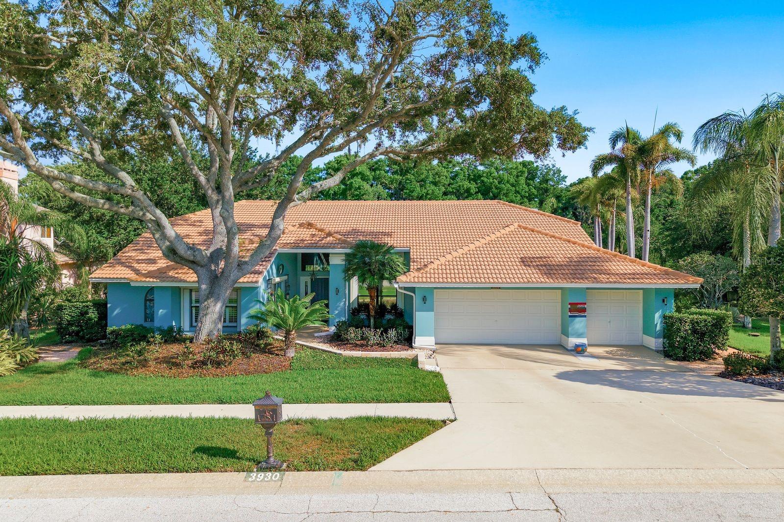 WATERFRONT BEAUTY on a POND and LAKE TARPON this beautifully REMODELED and METICULOUSLY MAINTAINED residence is tucked away in the highly sought-after community of THE PRESERVE at LAKE TARPON. Situated on an elevated, rare EXPANSIVE 1.5 LOT HOMESITE, this property offers the ultimate blend of LUXURY, COMFORT and PEACE OF MIND  - NO FLOOD INSURANCE. Step inside to find a spacious, thoughtfully designed floor plan featuring 4 bedrooms, 3.5 bathrooms plus a private home office, or 5th bedroom. Elegant Brazilian ENGINEERED HARDWOOD flooring flows seamlessly throughout the living spaces complimented by ceramic tile in the kitchen and bathrooms. The interior shines with a FRESH COAT OF PAINT in a warm inviting neutral palette. At the heart of the home is a chef-inspired kitchen boasting beautiful wood cabinetry and a large breakfast nook, which opens via sliders to your outdoor paradise. There are expansive Granite Countertops and updated Stainless Steel appliances. THE PERFECT ENTERTAINER'S HOME -adjacent to the kitchen, the HUGE FAMILY ROOM serves as perfect gathering space, anchored by a charming fireplace and TWO SETS OF FRENCH DOORS leading to the PAVER PATIO with EXQUISITE LANDSCAPING. The SPLIT FLOOR PLAN ensures privacy for the Primary Suite and ENSUITE BATHROOM featuring custom double sink vanity, inviting soaking tub and huge step-in shower. Three other bedrooms and two more bathrooms provide spacious options for for guests and family. Enjoy the OUTDOOR OASIS with a sparkling SPILL-OVER pool and spa, recently enhanced with a NEW POOL PUMP (2025) serene views of the pond and Lake Tarpon and the BEAUTIFULLY LANDSCAPED paver side patio. For added efficiency, the irrigation systems draws directly from the pond and also has a NEW PUMP (2026). Built for ultimate security the home is equipped with 22KW GENERAC whole-house generator. Meticulous care is evident throughout, and the owner has provided a complete list of upgrades, appliance dates and trusted vendors for the next lucky homeowner (see attachments). The location is private yet convenient to A-rated schools, shopping, entertainment, world famous Gulf beaches and Tampa International Airport. Don't miss this chance to own this turn-key piece of paradise.