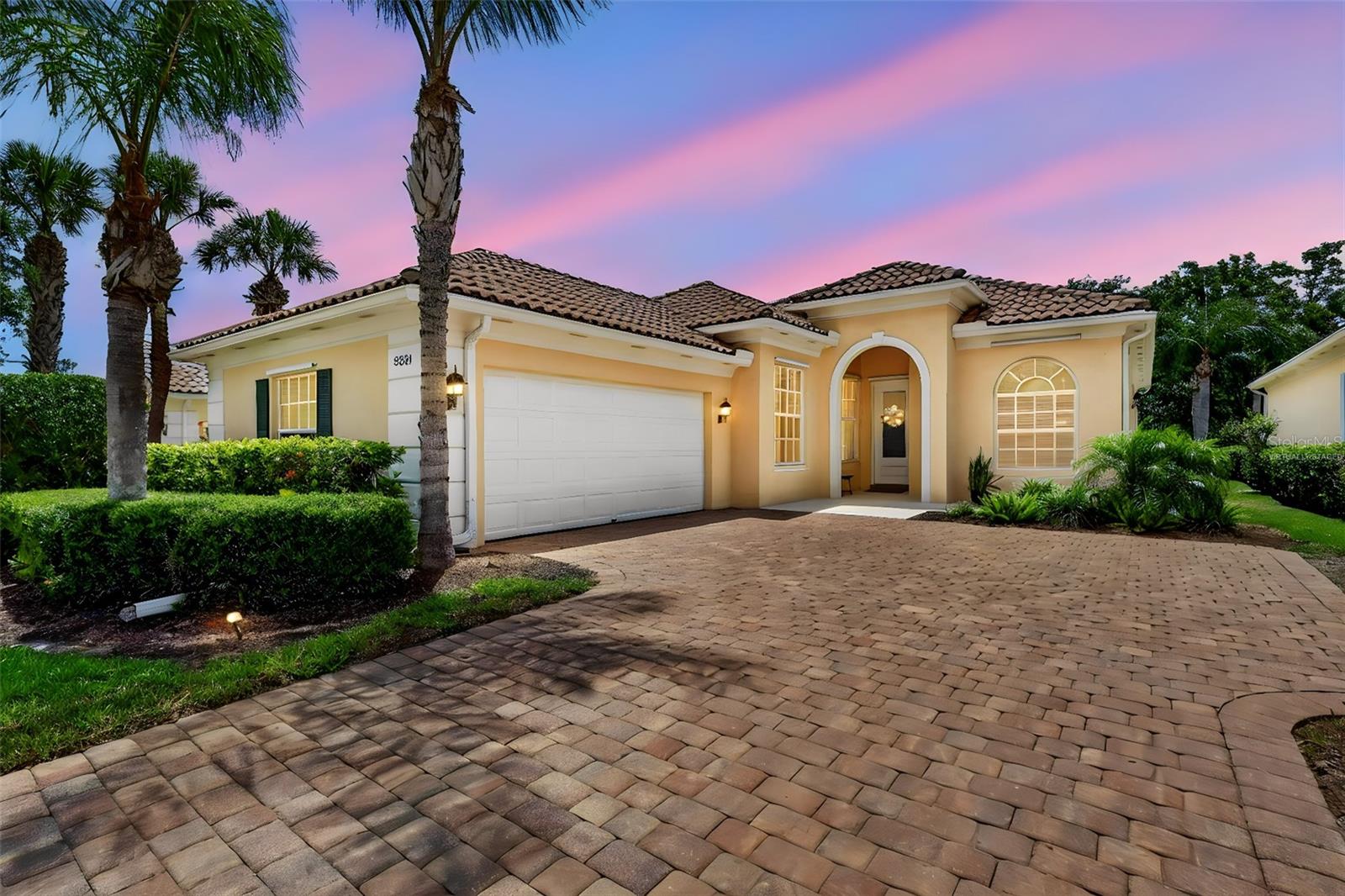 Welcome to a home where thoughtful design, extensive upgrades, and everyday comfort come together in one of the area’s most amenity-rich gated communities. Backing to a peaceful preserve setting, this beautifully updated Oakmont model offers a rare combination of privacy, functionality, and elevated finishes that truly set it apart. Widely recognized as one of the community’s most popular floor plans, this home also features the sought-after extended living room option, creating an even more open and inviting gathering space. 
With over $100,000 invested in renovations and improvements, few homes in the community have been updated to this level of quality & detail.
The heart of the home is the beautifully renovated custom kitchen featuring quartz countertops & backsplash, a spacious 7’3” island with storage on both sides, pull-out drawers throughout the kitchen, island, & pantry, a KitchenAid mechanical lift appliance cabinet, under-cabinet lighting, drawer microwave & a new induction stove installed in 2025 with all other appliances replaced two years ago. 
The open layout flows naturally into the living and dining areas, creating an inviting atmosphere for entertaining or simply enjoying everyday life. A custom dry bar with quartz counters and a wine cooler adds another stylish focal point. New LVP flooring throughout the main living areas, updated lighting & ceiling fans, new toilets, mechanical kitchen shade, & USB-equipped outlets throughout the home further enhance both comfort & convenience. New blinds on the living room slider & side entrance slider were installed approximately 18 months ago. 
Large sliders open to the new (2024) custom screened lanai, creating a seamless transition between indoor & outdoor living while offering peaceful preserve views & an ideal setting for morning coffee or evening relaxation.
The spacious primary suite was thoughtfully designed with custom closet systems, a walk-in closet with built-in desk, & additional linen storage in the ensuite. The well-appointed owners suite also features a distinctive dual-entry his & hers bath design with separate vanity areas, two private water closets, a garden tub, & a shared walk-through shower that creates a functional, spa-like retreat rarely found in today’s floor plans. The bathrooms were remodeled in 2015.
The freshly painted office provides flexible space for work, hobbies, or a comfortable resting place for your guests. 
Beyond the home itself, the community offers the ultimate in luxury Florida living with a guard-gated entrance, scenic walking and biking trails winding along the water, charming bridges inspired by the Venetian waterfront with postcard-worthy scenery throughout the neighborhood. Even the street names reflect an old-world Italian influence, adding to the character & charm that make this community so memorable. Get to know the friendly neighbors too! Enjoy a warm & welcoming atmosphere along with resort-style amenities including a tiki bar pool, lap pool, fitness center, tennis, pickleball, bocce ball, café, salon, gas station, clubhouse with fireplace, library, meeting rooms, catering kitchen, gift shop, planned activities, weekly newsletters, & a monthly community magazine.
This is more than just a beautifully renovated home—it’s a lifestyle designed around comfort, connection, and enjoying the best of Florida living. Schedule your private showing today & experience everything this exceptional home & community have to offer.