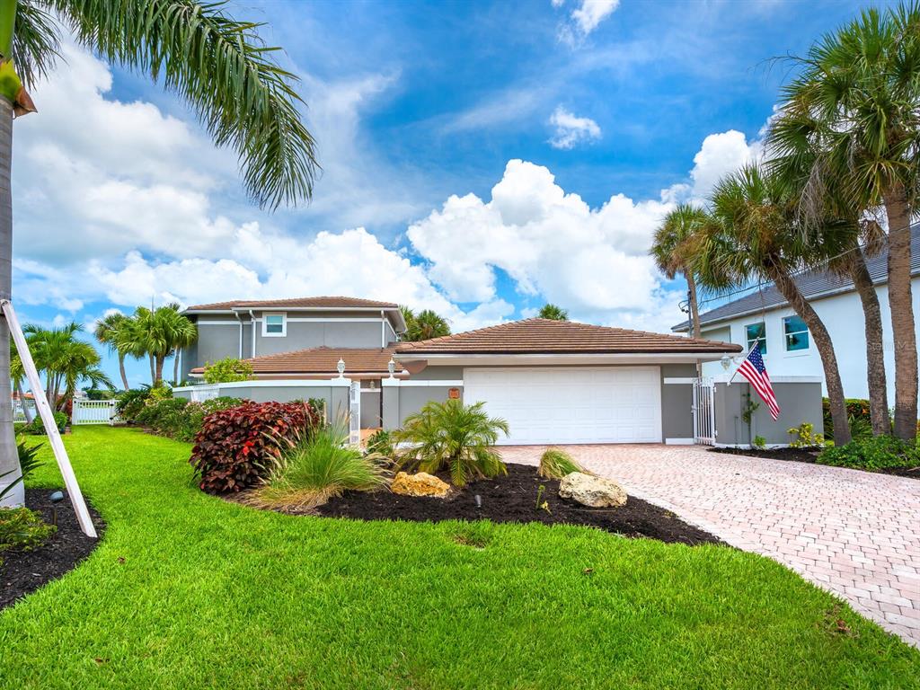 NEW! NEW! NEW! This Southpointe Shores waterfront home, boasting “A Million Dollar” renovation is located on Little Sarasota Bay. Among the many enhanced features is a new 2nd Story 600 sq. ft. owner’s suite with balcony strategically located to experience “never to forget” Sarasota sunsets, all new hurricane impact windows and sliders provide a panoramic view of the pool area and the bay. And then there is the new kitchen with new cabinets, appliances, hard surface counters with a view of visiting dolphins. Newly installed automated sunshades, window treatments and gas fireplace enhance comfort choices on the first level dining and living room; all protected by a new tile roof. New tile floors with a wood motif throughout are accented by tiled bathrooms. There is a 10,000-12,000 lb. boat lift and composite dock with water and electric. The seawall rehab is currently underway, at seller’s expense, and awaits your sailboat, cruiser, or kayak. This must-see home is ideally located on a Cul-de-sac in a neighborhood dominated by homes that protect your investment. Come discover the many additional features that await your visit. Room Feature: Linen Closet In Bath (Primary Bathroom).