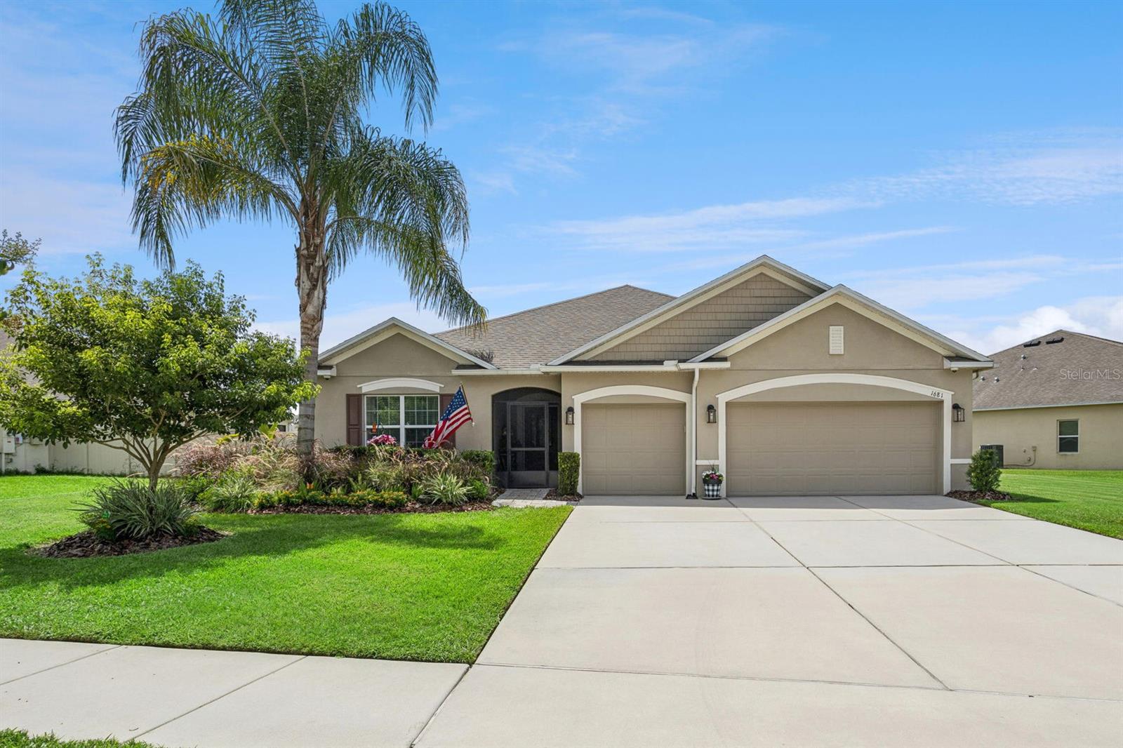 Welcome to this beautifully maintained 3-bedroom, 2-bath home with a dedicated office/den and a 3-car garage, ideally located in the sought-after Marsh Pointe community of Clermont. Built in 2020, this thoughtfully designed home offers over 2,050 square feet of living space on an expansive .27-acre homesite, providing an abundant amount of outdoor space and plenty of room to enjoy Florida living. Inside, you’ll find an open and inviting floor plan featuring a versatile office/den that’s perfect for working from home, a playroom, media room, or potential fourth bedroom. The spacious kitchen is the heart of the home, boasting granite countertops, stainless steel appliances, abundant cabinetry, a large center island, and an open flow into the dining and living areas, making it ideal for entertaining. Tile flooring throughout the main living areas and comfortable carpet in the bedrooms create a warm and functional living environment. The generous primary suite features a walk-in closet and a private ensuite bath, while two additional bedrooms provide comfortable accommodations for family or guests. Step outside and enjoy both the screened front porch and the screened rear paver lanai, offering the perfect places to relax and unwind. The oversized backyard provides ample space for outdoor entertaining, pets, gardening, or even a future pool, giving the next owner endless possibilities. Additional features include an 8-camera security system, excellent curb appeal, and a spacious 3-car garage with plenty of room for vehicles, storage, or a workshop. Nestled in the desirable Marsh Pointe community, surrounded by protected marshland, you’ll enjoy a peaceful setting while remaining just minutes from shopping, dining, top-rated schools, waterfront parks, and the charming shops and restaurants of historic downtown Clermont. With a newer roof and HVAC system, a flexible floor plan, an oversized homesite, and numerous desirable upgrades, this move-in-ready home is the perfect blend of comfort, functionality, and location. Schedule your private showing today!