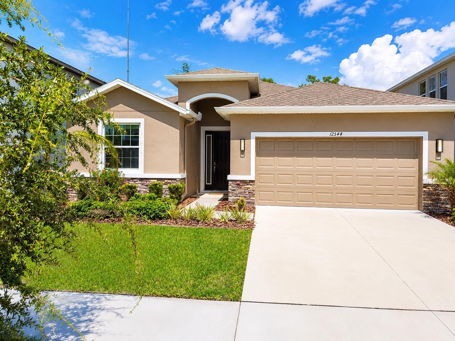 Under Construction. Welcome to this spacious 4-bedroom, 2.5-bathroom home offering 2,035 square feet of comfortable living space in the desirable Cedarbrook community of Riverview, Florida. Designed with both style and functionality in mind, this home features an open and inviting layout with modern finishes throughout. Enjoy lofty 9'4” ceilings on the first floor, a beautifully appointed kitchen with 42” staggered-mount cabinets, crown molding, granite countertops, stainless steel appliances, and quality finishes that bring a polished, move-in ready feel to the home. The spacious living areas provide plenty of room to relax, entertain, and enjoy everyday living, while the well-designed bedroom layout offers comfort and privacy. The primary suite creates a peaceful retreat, complete with a private bathroom and generous space to unwind. Located in Cedarbrook, just off Rhodine Road and east of Balm Riverview Road, US-301, and I-75, this community offers the perfect balance of convenience and a relaxed rural feel. Residents enjoy a resort-style pool, pickleball courts and being surrounded by parks, nature preserves, and scenic trails while still remaining close to shopping, dining, and everyday essentials. Experience modern comfort, thoughtful design, and a convenient Riverview location in this beautiful Cedarbrook home.