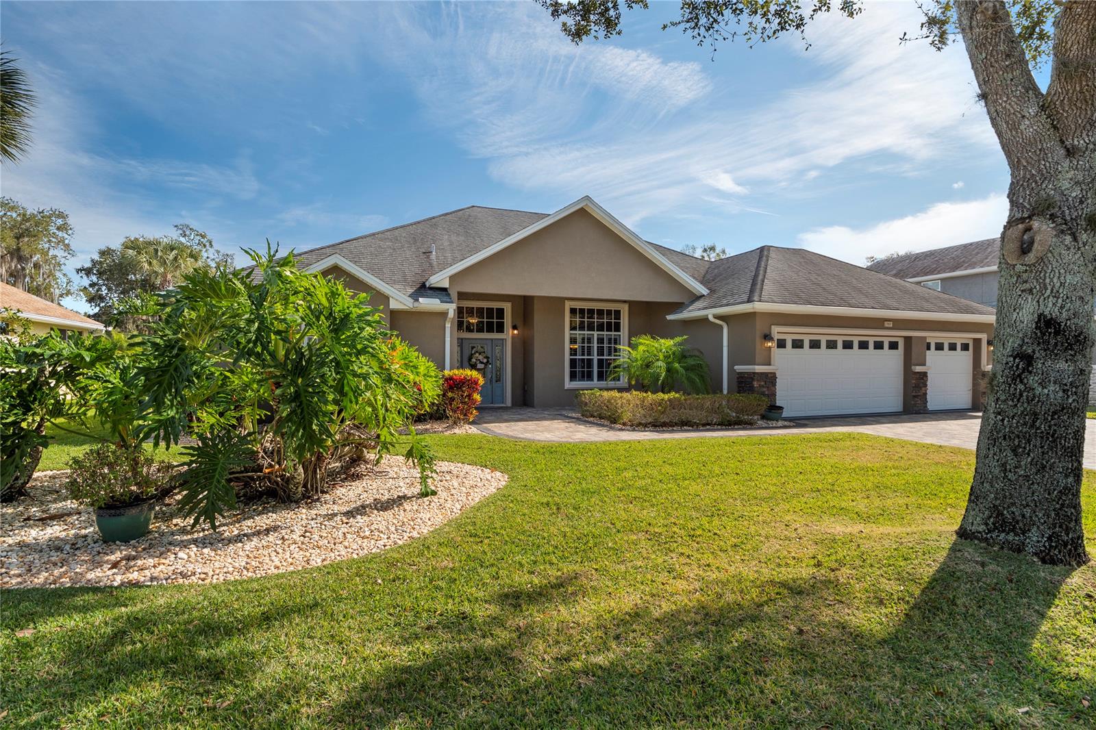 This home is a Buyers dream come true!!  Gorgeously landscaped home on a cul-de-sac in a gated community!  This home has been well maintained, 3 years new AC unit, Solar panels installed 1 year ago, Exterior and interior of home painted 3 yrs new, Tile flooring and plantation shutters in main living areas.  Tray ceiling details in the foyer, dining and master bedroom! ample fans interior and exterior, 3 car garage, paver driveway, walkway and front entry in addition to the back lanai and pool surround!  Don't miss this beautiful home!!! ;Water: City