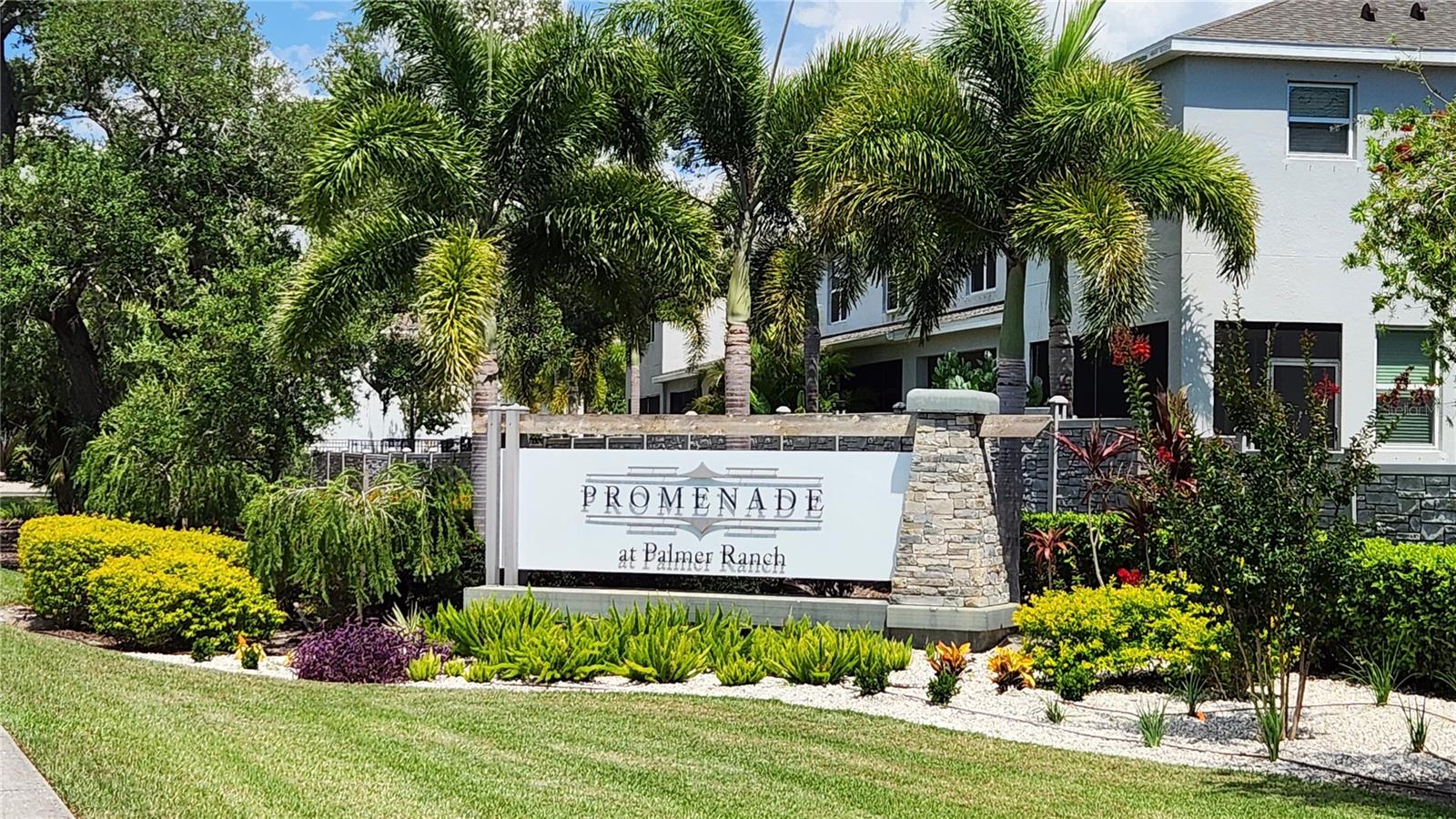 Move right into this immaculate, beautifully maintained 2018-built townhome in the gated community of Promenade at Palmer Ranch, where comfort, convenience, and an exceptional location come together. Major updates include a NEW ROOF and NEW HVAC (2025), plus a new garage door opener, refinished garage floor, and added garage shelving (2026). Best of all, this home has had no flooding. Offered partially furnished (with only a few excluded items), it's truly move-in ready and ideal as a full-time residence or seasonal retreat. This spacious 3-bedroom, 2.5-bath home with a 1-car garage features hard surface flooring throughout with ceramic tile and new laminate flooring (2025)—no carpet anywhere. Built with concrete block walls between adjoining homes, you'll appreciate the added peace and quiet. The open-concept kitchen is designed for entertaining with a large granite island, abundant counter space, updated lighting, a walk-in pantry, and additional storage beneath the stairs. Sliding glass doors lead to a screened lanai featuring a motorized solar shade, while the extended paver patio added in May 2026 creates the perfect outdoor living space overlooking the peaceful rear canal. Enjoy added privacy from this desirable perimeter location with tranquil views. Upstairs, the spacious primary suite offers a walk-in closet and private en-suite bath, while two additional bedrooms provide flexible space for guests, a home office, or hobbies. Hurricane shutters are included for all windows and sliding glass doors for added peace of mind. Low HOA fees include water, sewer, trash, lawn maintenance, and community amenities. Residents enjoy a sparkling pool and covered gathering area complete with a cozy fireplace. The Legacy Trail is just beyond the rear canal, providing easy access to miles of biking, walking, and outdoor recreation. Located just minutes from shopping, dining, and everyday conveniences, and only 5 miles from world-famous Siesta Key Beach, this exceptional home offers the Florida lifestyle you've been waiting for. Schedule your private showing today!