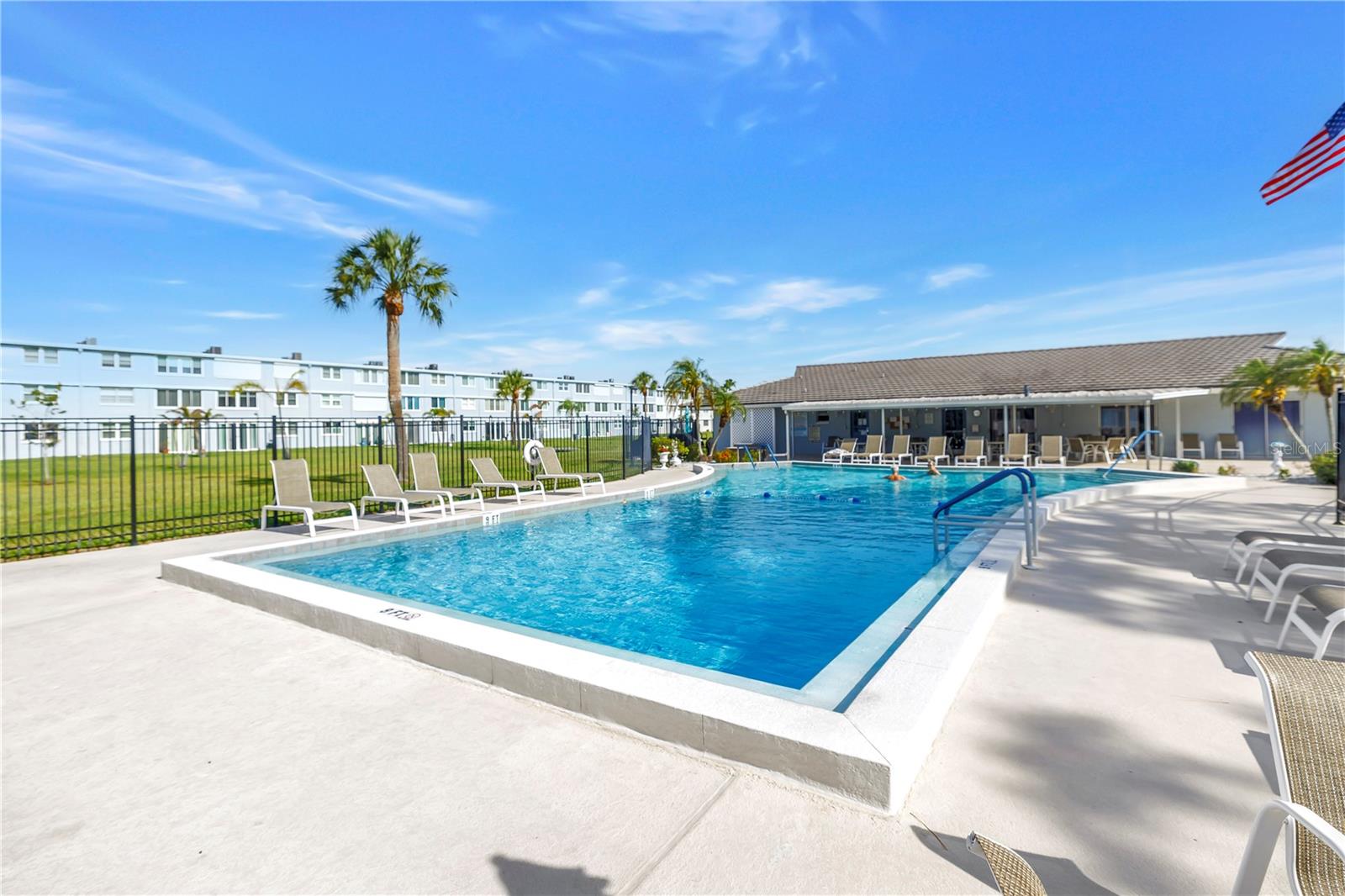 Enjoy the Florida lifestyle in beautiful Winston Park - a superbly maintained 55+ community in Northeast St Pete near shopping, dining, bike trails leading to downtown St Pete, waterfront parks and enjoy the outdoors year round! This 3rd floor unit is accessible by a nearby staircase or elevator and the top floor unit complete with HURRICANE RATED WINDOWS that open to the central courtyard. Enjoy the fabulous amenities amenities and activities in the clubhouse, at the heated pool, shuffleboard courts, BBQ grills and well-maintained grounds and courtyard with walking paths. and green space. You're just minutes away from shopping, dining, medical facilities, and everything you need. Shopping is convenient at Northeast Park Center including Publix and Whole Foods. Monthly fee of $748 includes exterior maintenance, manager, cable, internet, water and garbage and sewer. Residents must be 55+ / no dogs. The laundry room is on every floor, just steps from the unit. A large living / dining room leads through to the spacious kitchen with a bright and sunny breakfast room / flex space overlooking the outdoors. A private main bedroom features a walk in closet and full bath with tub/shower. A guest bedroom and bath is perfect for guests and has a stand up shower. HVAC replaced 2024. Assigned covered CARPORT PARKING & storage closet included.