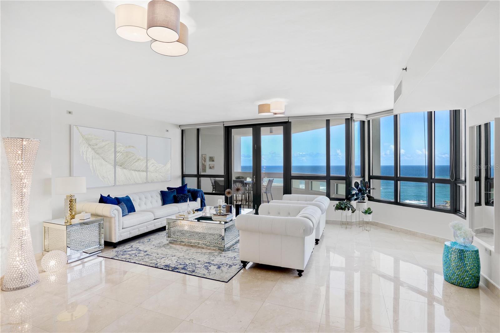 Experience exclusive living at Caribe Plaza Condominium with this exceptional 16th-floor residence offering captivating ocean and city views, spanning 3,793 square feet. This remarkable unit boasts a private foyer, 4 bedrooms, 4 full baths, 1 powder room, expansive living and dining areas, spacious kitchen with an inviting breakfast nook, family room, and a tranquil terrace ideal for relaxation while admiring the stunning ocean vistas and enjoying the refreshing northeasterly breeze. Each en-suite bedroom showcases breathtaking ocean views.  Included are four deeded parking spaces and a private storage room for added convenience.

Caribe Plaza ensures upscale living, providing top-tier amenities such as concierge service, 24-hour security, valet service, gym, an ocean-facing pool, and an exclusive resident's lounge. Situated in Paseo Caribe next to the Caribe Hilton Hotel, residents delight in a luxurious island lifestyle with easy access to Old San Juan, downtown Condado, Robinson and St John’s Schools, the Convention Center District, and the San Juan International Airport.